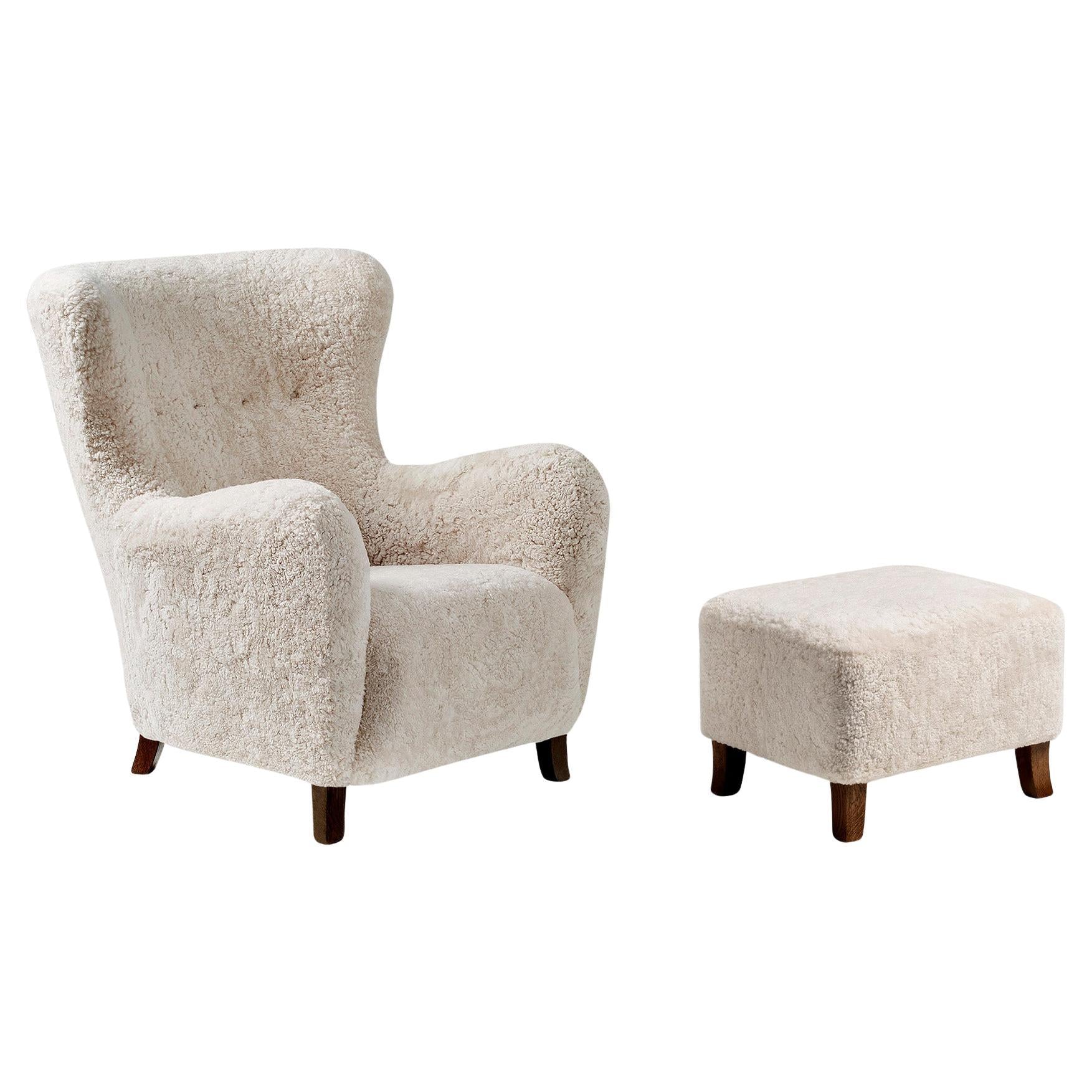 https://a.1stdibscdn.com/sheepskin-sampo-chair-ottoman-for-sale/f_13332/f_362756921738683863471/f_36275692_1738683863990_bg_processed.jpg