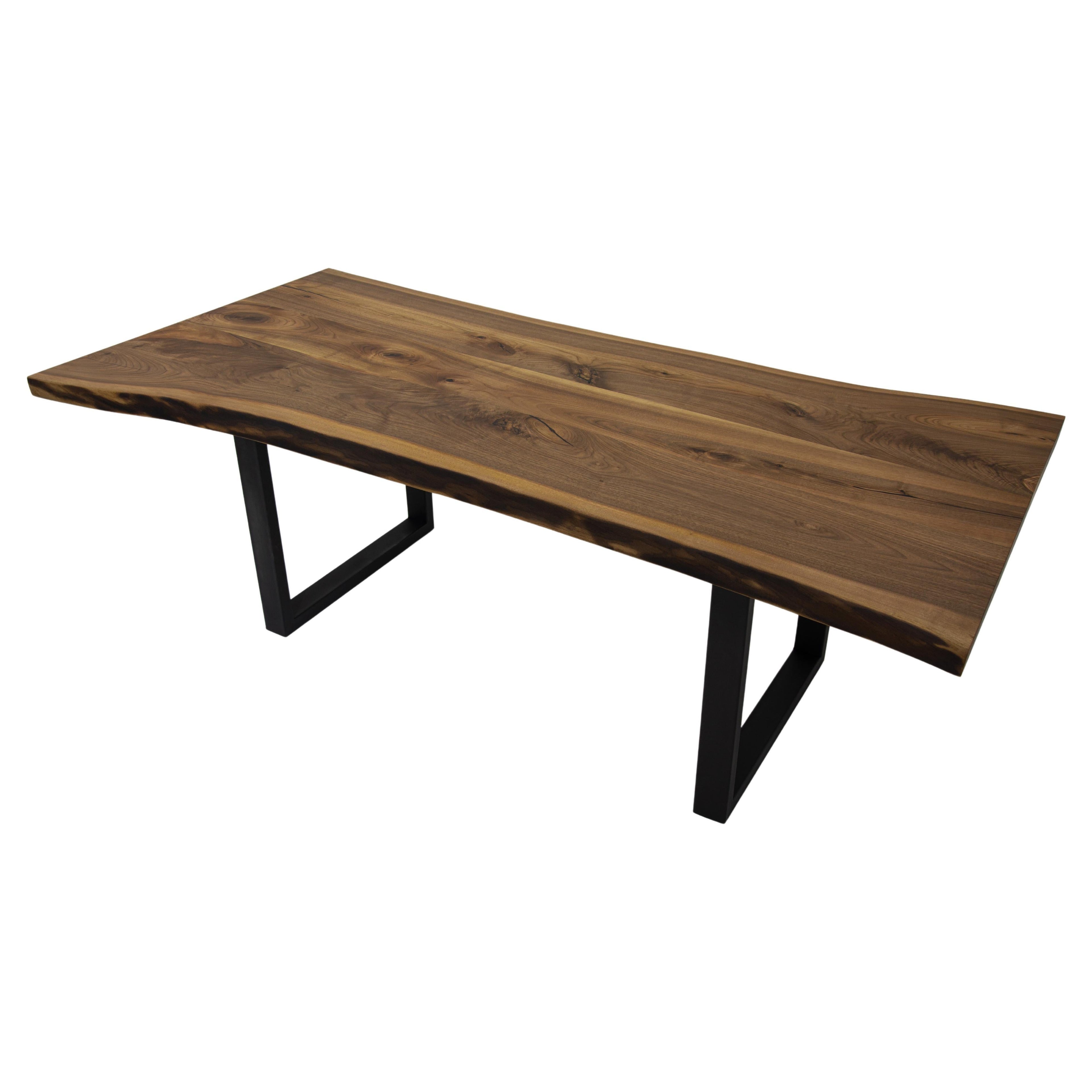 https://a.1stdibscdn.com/live-edge-solid-walnut-wood-dining-table-for-sale/f_91932/f_363621621695893812058/f_36362162_1695893813501_bg_processed.jpg
