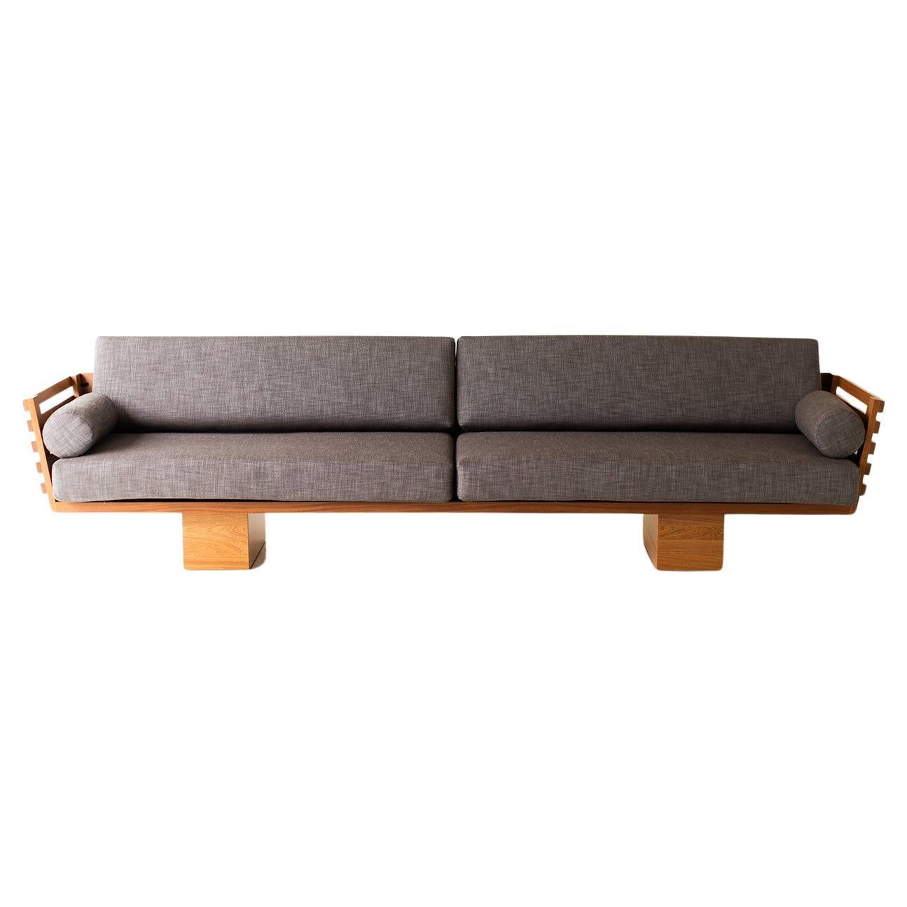 https://a.1stdibscdn.com/large-outdoor-slatted-suelo-sofa-for-sale/f_9720/f_363717821696275672478/f_36371782_1696275672711_bg_processed.jpg