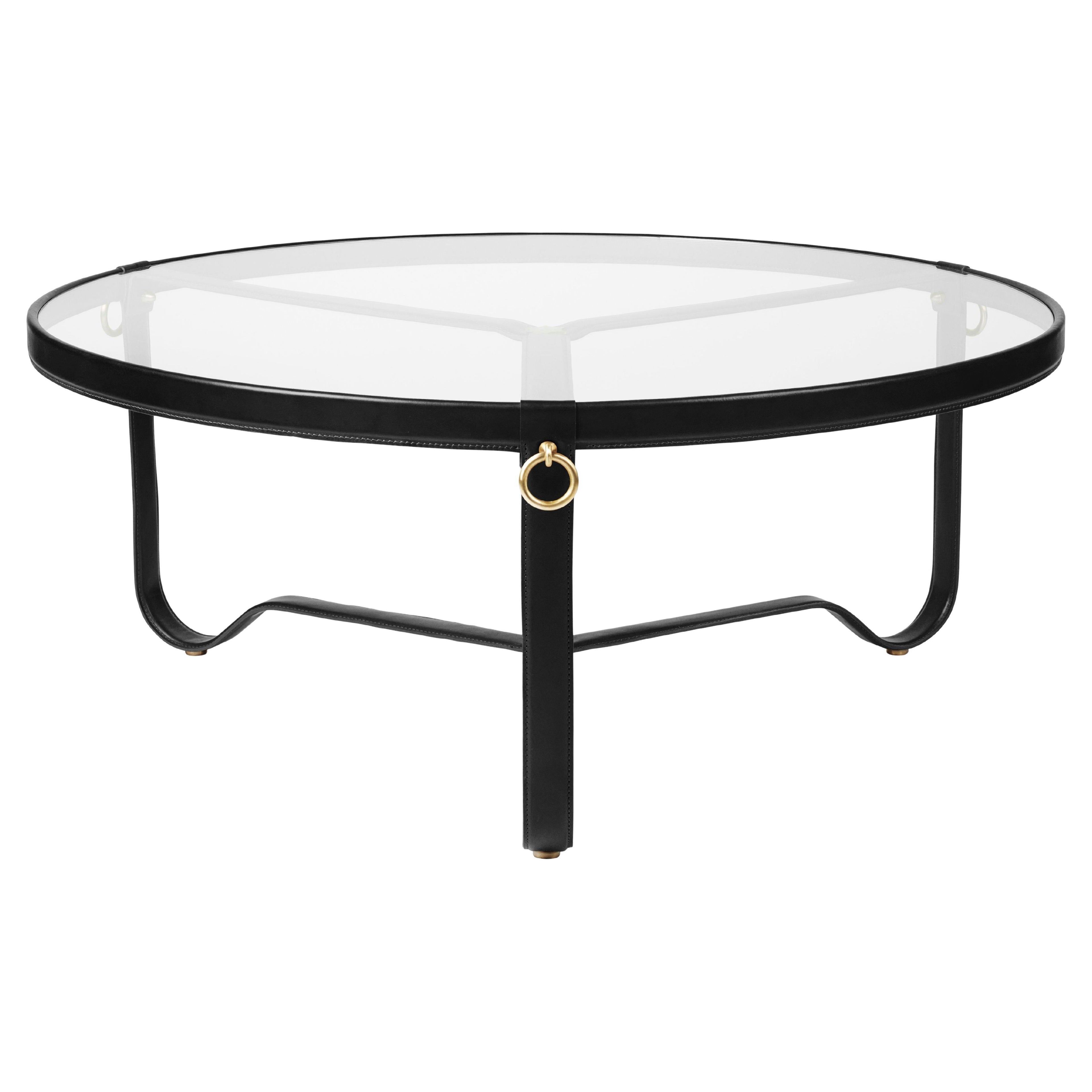 https://a.1stdibscdn.com/large-jacques-adnet-circulaire-glass-and-black-leather-coffee-table-for-gubi-for-sale/f_14472/f_365626021697036877847/f_36562602_1697036879372_bg_processed.jpg