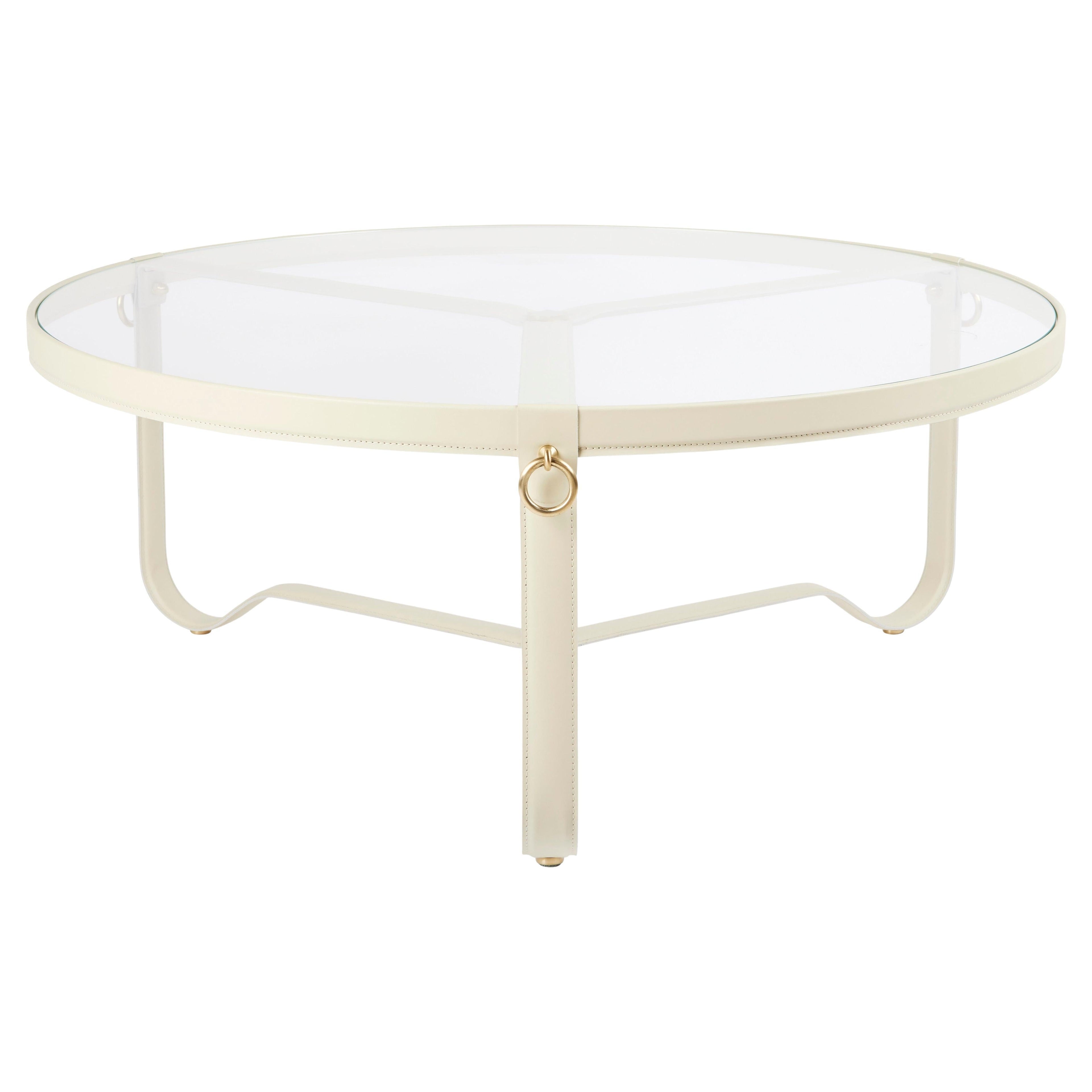 https://a.1stdibscdn.com/large-jacques-adnet-circulaire-glass-and-cream-leather-coffee-table-for-gubi-for-sale/f_14472/f_365633321697038385490/f_36563332_1697038387002_bg_processed.jpg