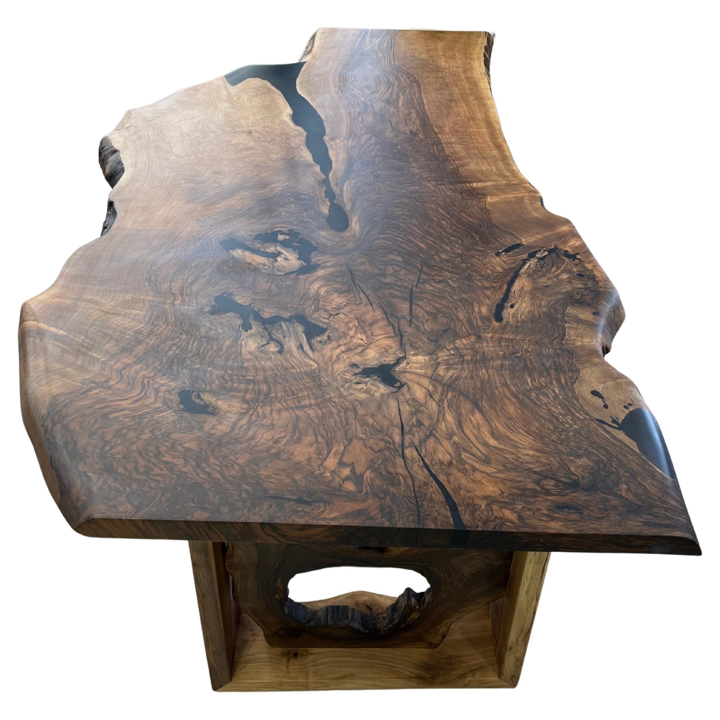 https://a.1stdibscdn.com/black-walnut-custom-live-edge-table-for-sale/f_91932/f_366017021697211254949/f_36601702_1697211256187_bg_processed.jpg
