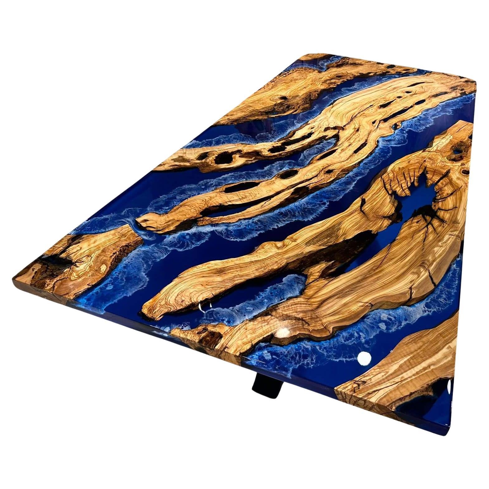 https://a.1stdibscdn.com/olive-epoxy-resin-dining-table-blue-resin-wood-table-for-sale/f_91932/f_367987921698833903604/f_36798792_1698833904181_bg_processed.jpg