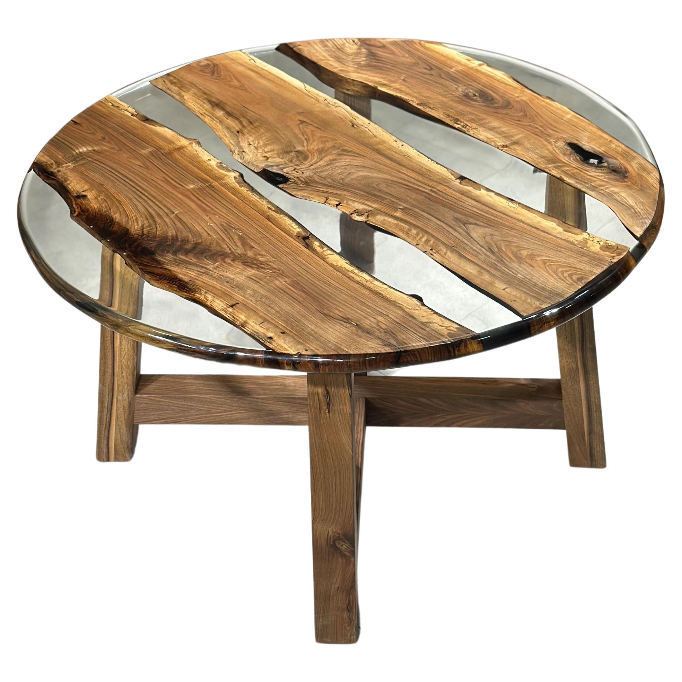 https://a.1stdibscdn.com/wooden-clear-transparent-round-resin-table-for-sale/f_91932/f_368116521698399202960/f_36811652_1698399203938_bg_processed.jpg