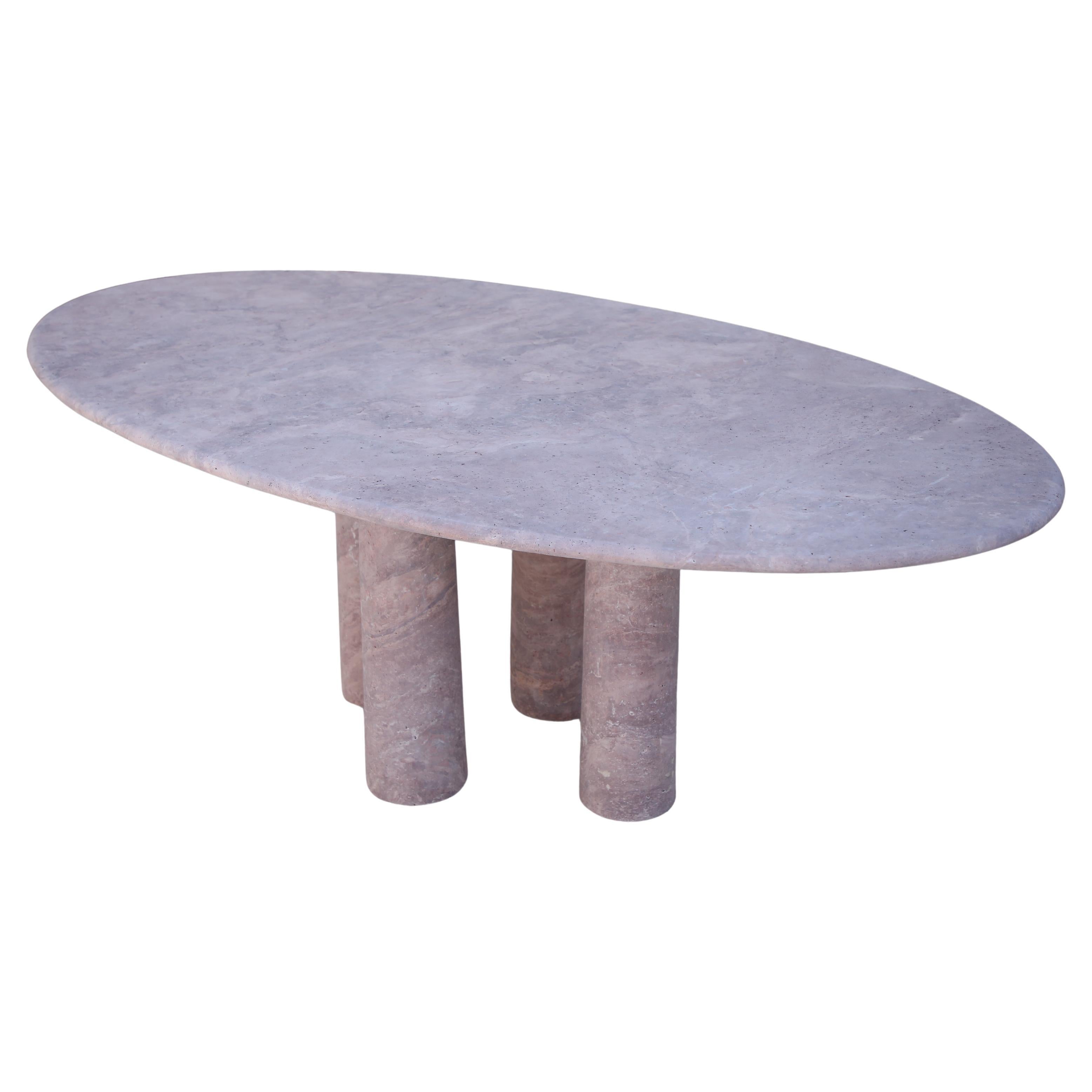 https://a.1stdibscdn.com/oval-red-travertine-dining-table-with-column-legs-in-the-style-of-mario-bellini-for-sale/f_80522/f_368406621739747343987/f_36840662_1739747344990_bg_processed.jpg