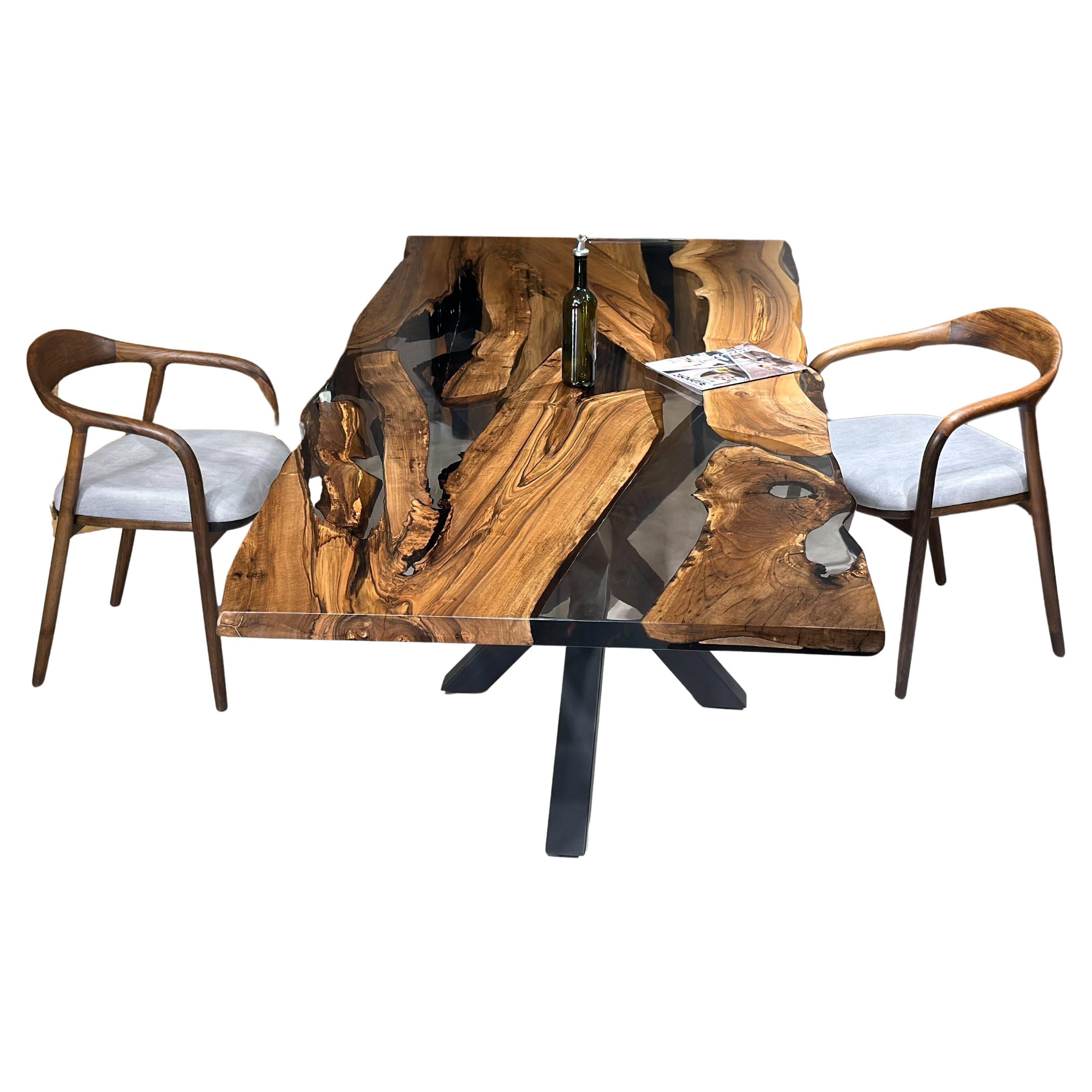 https://a.1stdibscdn.com/black-walnut-epoxy-resin-dining-table-custom-wood-live-edge-table-for-sale-picture-2/f_91932/f_368446421727173071765/f_36844642_1727173072869_bg_processed.jpg