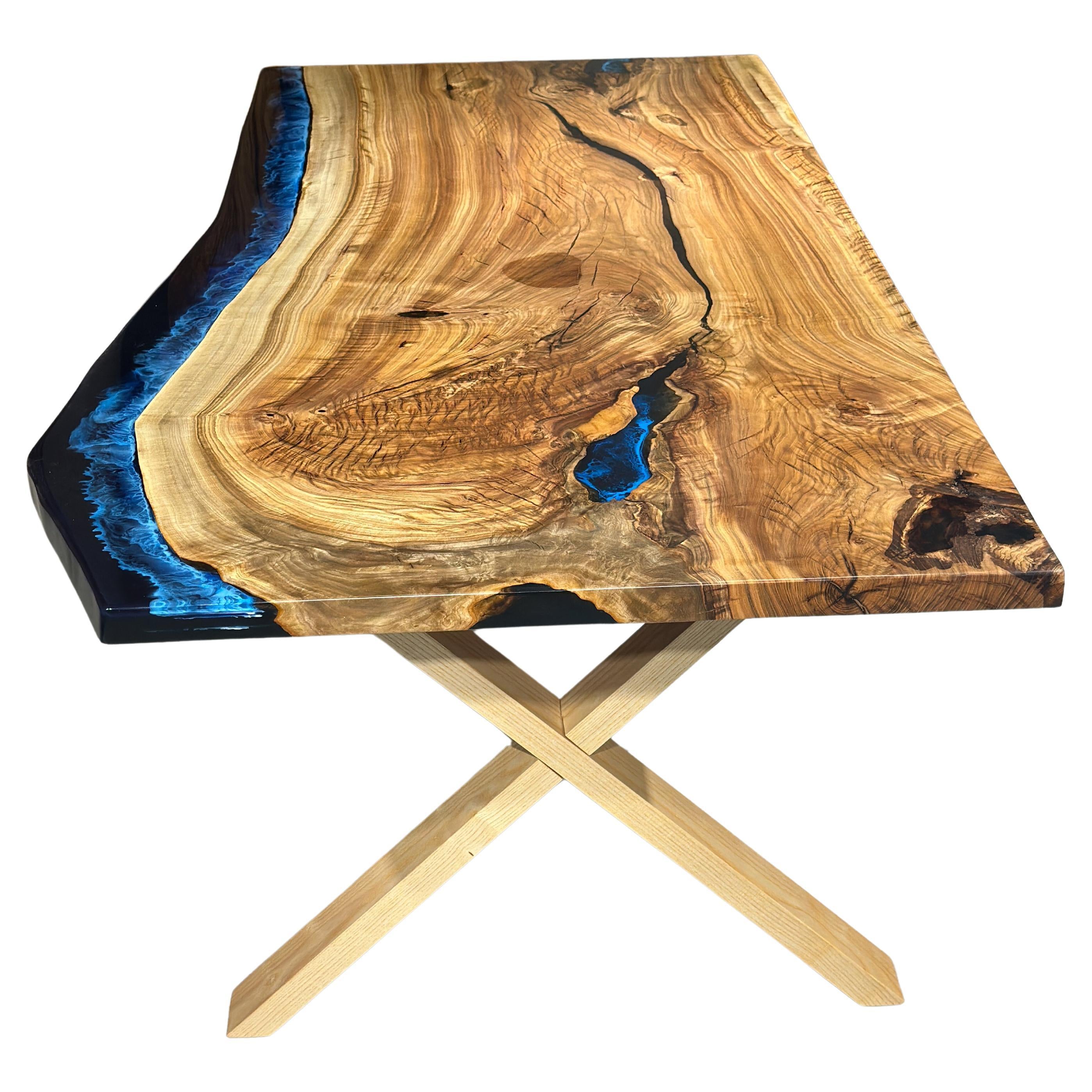 https://a.1stdibscdn.com/blue-resin-light-wood-dining-table-blue-epoxy-table-for-sale/f_91932/f_368984521698921633430/f_36898452_1698921635259_bg_processed.jpg