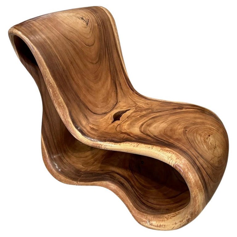 https://a.1stdibscdn.com/andrianna-shamaris-impressive-soar-wood-sculptural-chair-for-sale/f_10806/f_375244621702640882377/f_37524462_1702640882591_bg_processed.jpg?width=768