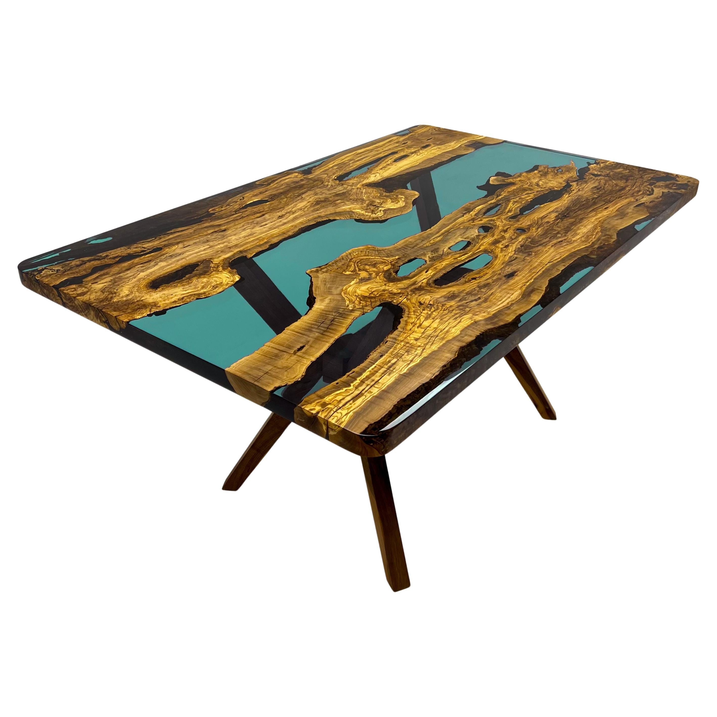 https://a.1stdibscdn.com/turquoise-custom-epoxy-resin-dining-wood-table-for-sale/f_91932/f_377333121703858701355/f_37733312_1703858702415_bg_processed.jpg