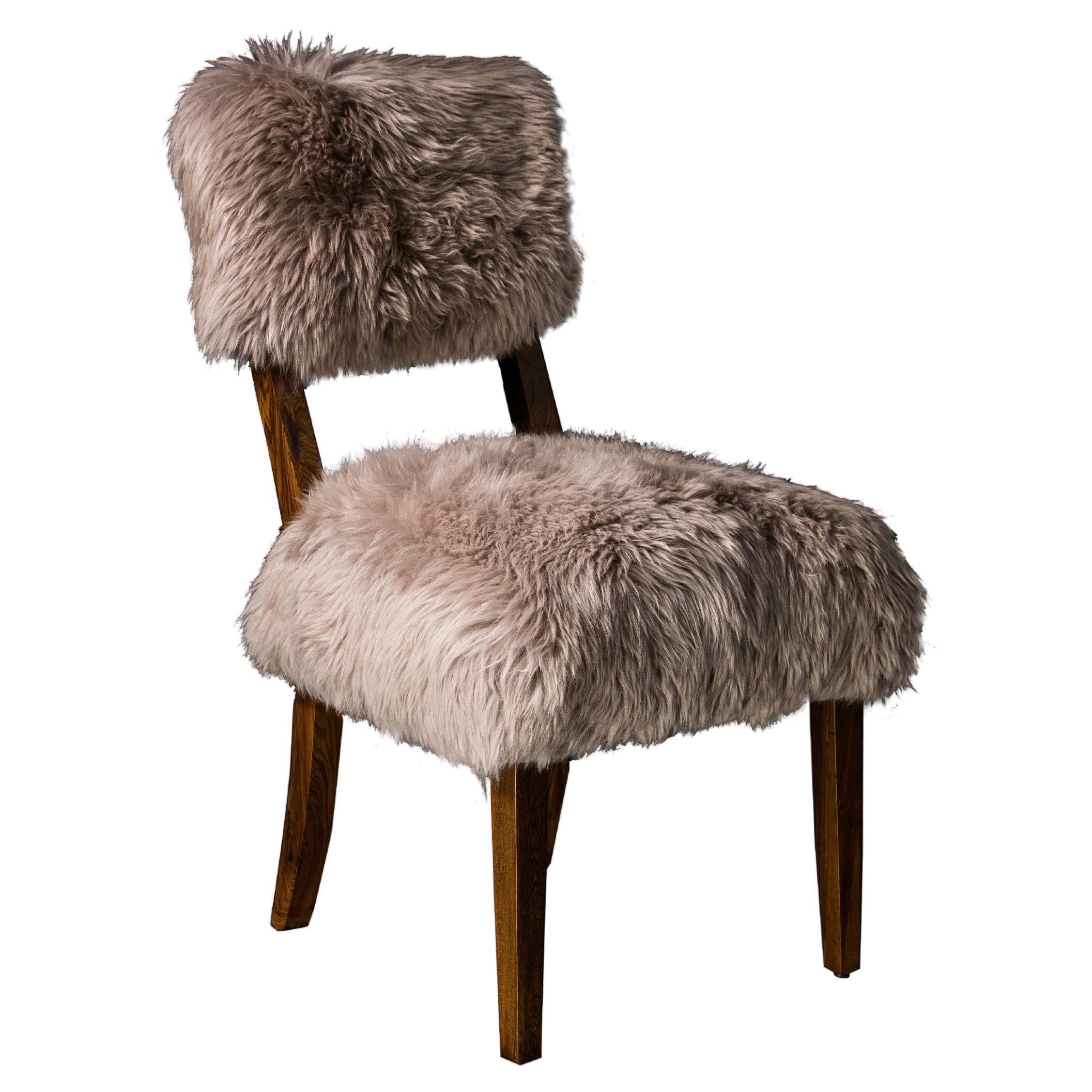 https://a.1stdibscdn.com/modern-dining-chair-in-exotic-wood-and-sheepskin-from-costantini-luca-ovino-for-sale/f_25173/f_377721921704301252771/f_37772192_1704301253675_bg_processed.jpg