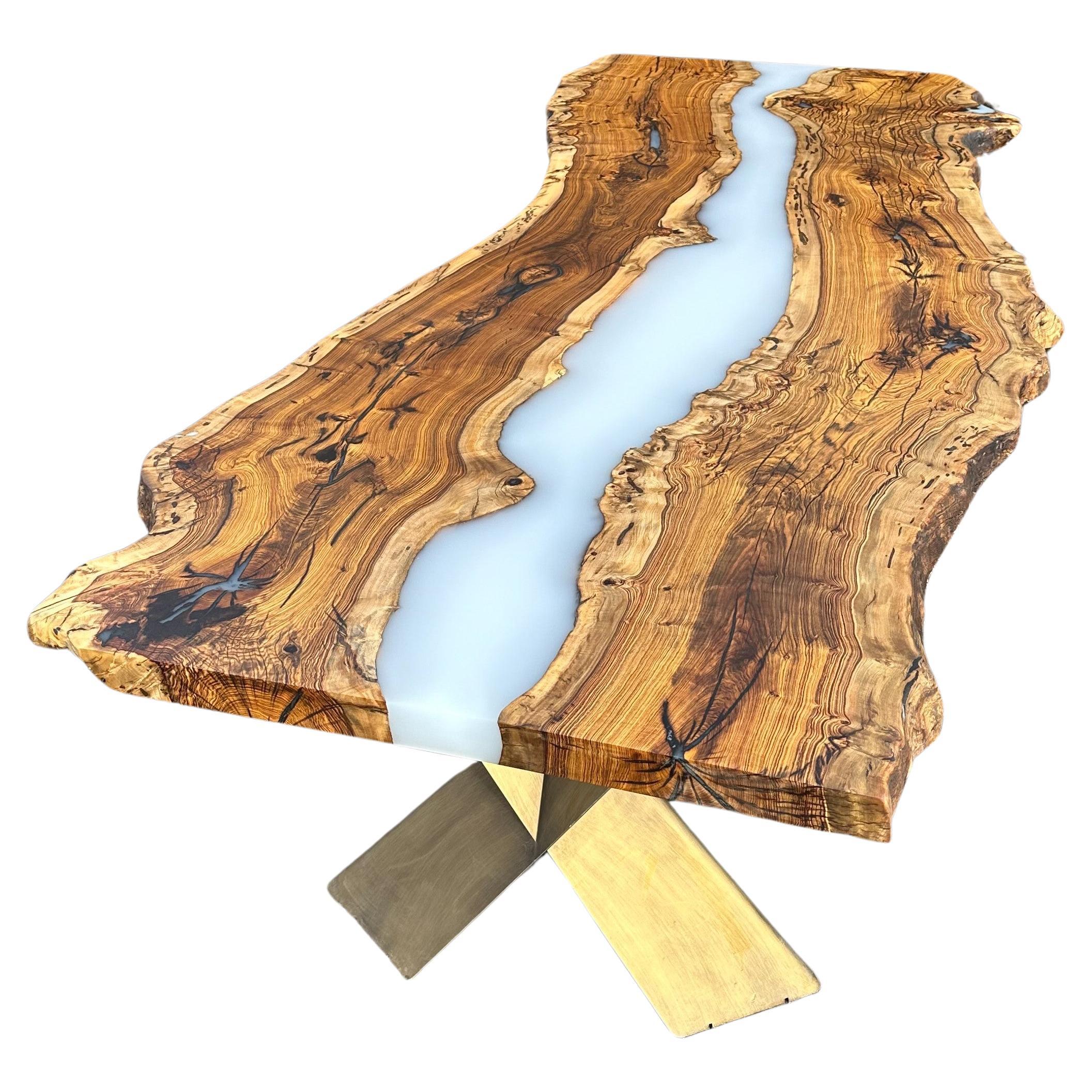 https://a.1stdibscdn.com/live-edge-hackberry-wood-epoxy-resin-river-dining-table-for-sale/f_91932/f_380449621705910768394/f_38044962_1705910769346_bg_processed.jpg