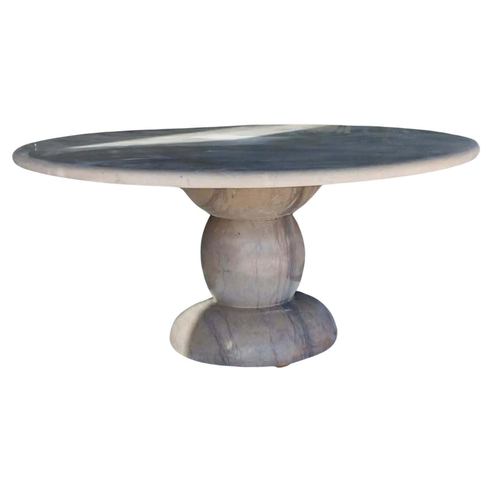 https://a.1stdibscdn.com/large-solid-stone-sculptural-marble-round-outdoor-dining-table-for-sale/f_80522/f_381085221711891627982/f_38108522_1711891628325_bg_processed.jpg