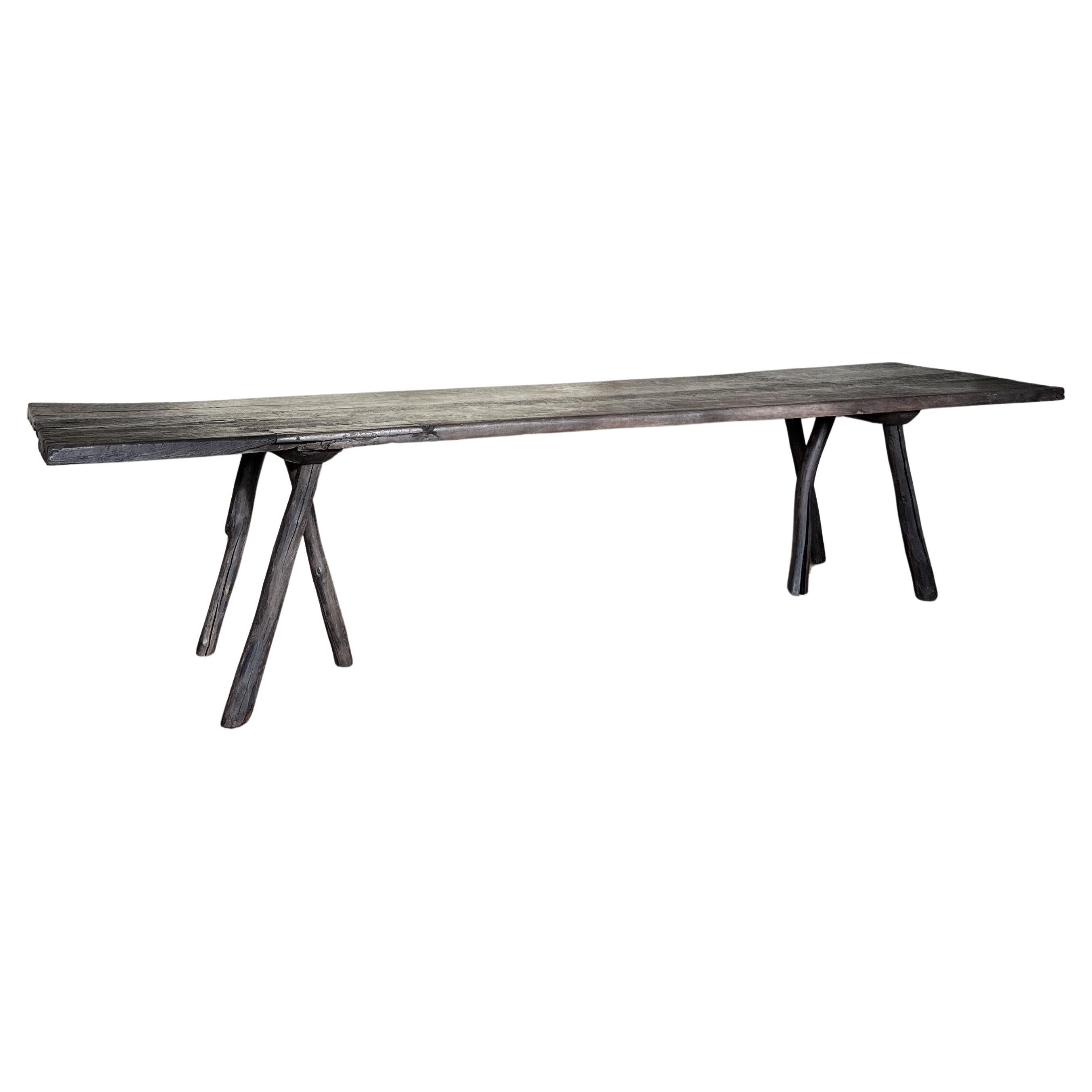 https://a.1stdibscdn.com/large-organic-table-reclaimed-wood-for-sale/f_20233/f_382744321707172629606/f_38274432_1707172630253_bg_processed.jpg