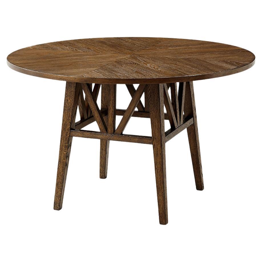 https://a.1stdibscdn.com/dark-rustic-oak-round-dining-table-for-sale/f_8038/f_382759821707192345706/f_38275982_1707192345980_bg_processed.jpg