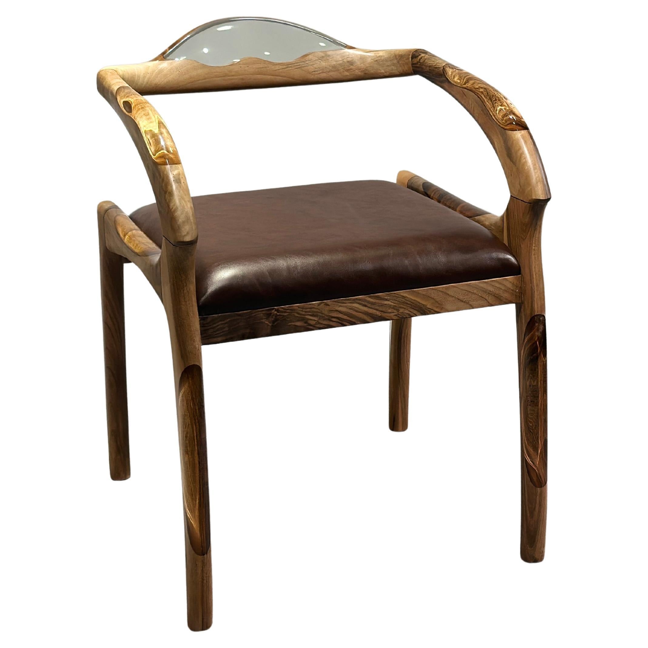 https://a.1stdibscdn.com/clear-epoxy-walnut-chair-for-sale/f_91932/f_383529521748255159661/f_38352952_1748255160360_bg_processed.jpg