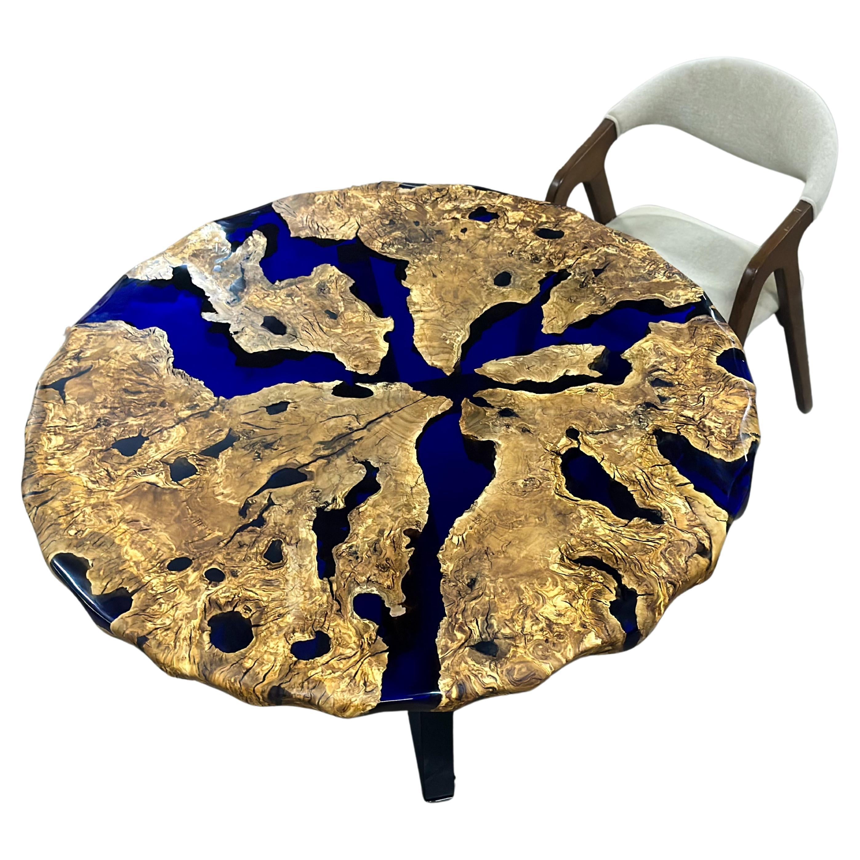 https://a.1stdibscdn.com/custom-olive-epoxy-resin-round-dining-table-for-sale/f_91932/f_383876921707823170295/f_38387692_1707823171687_bg_processed.jpg