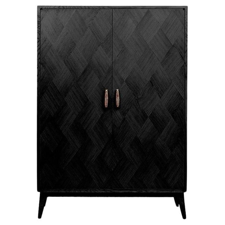 https://a.1stdibscdn.com/contemporary-black-oak-marquetry-cabinet-with-cast-bronze-handles-for-sale/f_27693/f_385505121708726116319/f_38550512_1708726116616_bg_processed.jpg?width=768