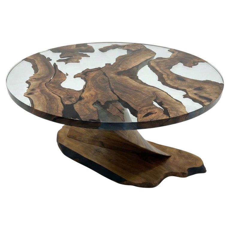 https://a.1stdibscdn.com/tywin-round-dining-table-swirl-walnut-wood-crystal-clear-resin-epoxy-for-sale/f_96082/f_385509821770535612228/f_38550982_1770535612709_bg_processed.jpg?width=768