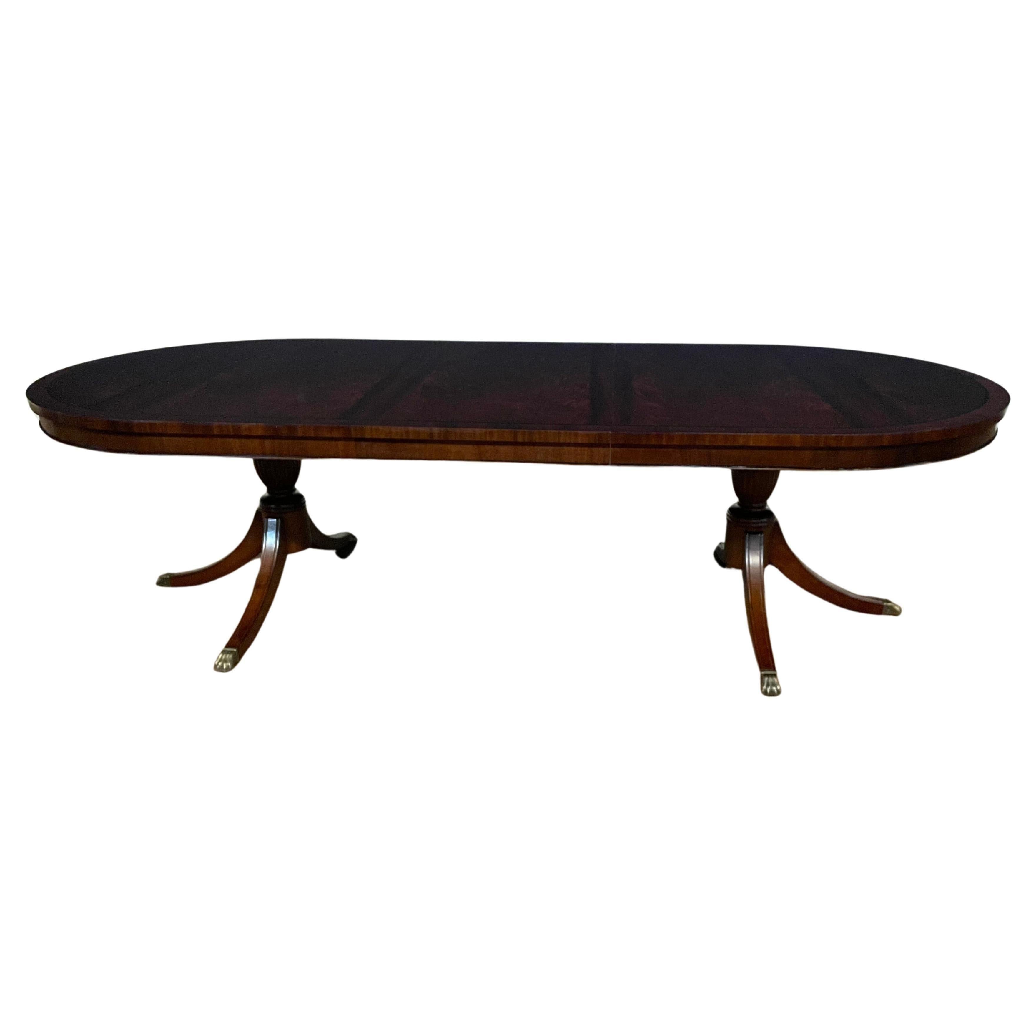 https://a.1stdibscdn.com/oval-mahogany-double-pedestal-dining-table-by-leighton-hall-made-to-order-for-sale/f_44162/f_38569012/f_38569012_1708870928368_1708871198156_master.jpg