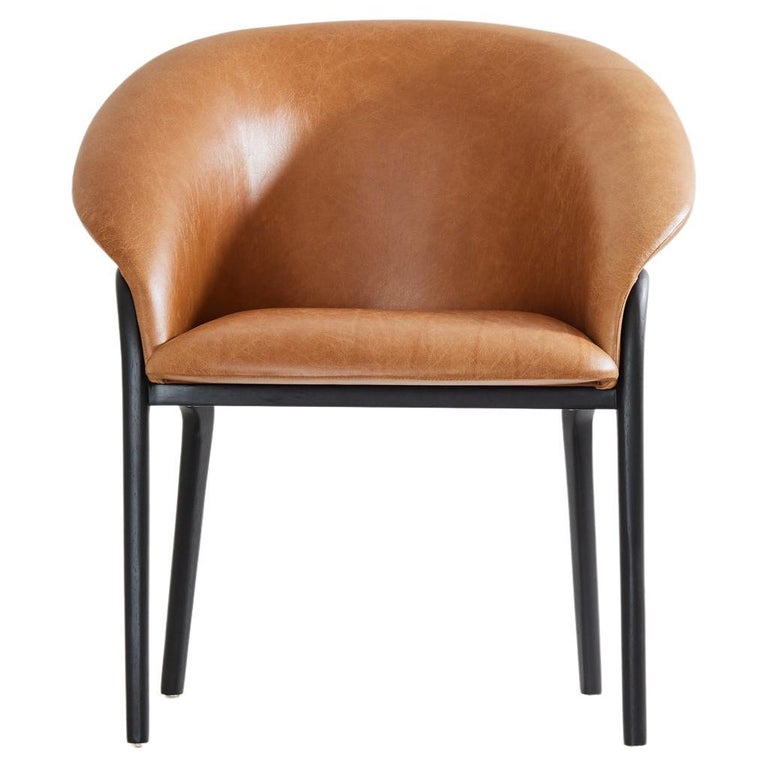 https://a.1stdibscdn.com/minimalist-organic-chair-in-black-solid-wood-camel-leather-seating-tone-for-sale/f_35593/f_389189821710882437087/f_38918982_1710882437451_bg_processed.jpg?width=768