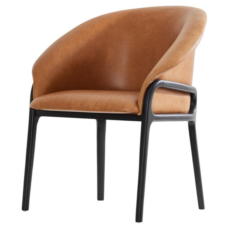 https://a.1stdibscdn.com/minimalist-organic-chair-in-black-solid-wood-camel-leather-seating-tone-for-sale/f_35593/f_389190621710882705774/f_38919062_1710882706079_bg_processed.jpg?width=768