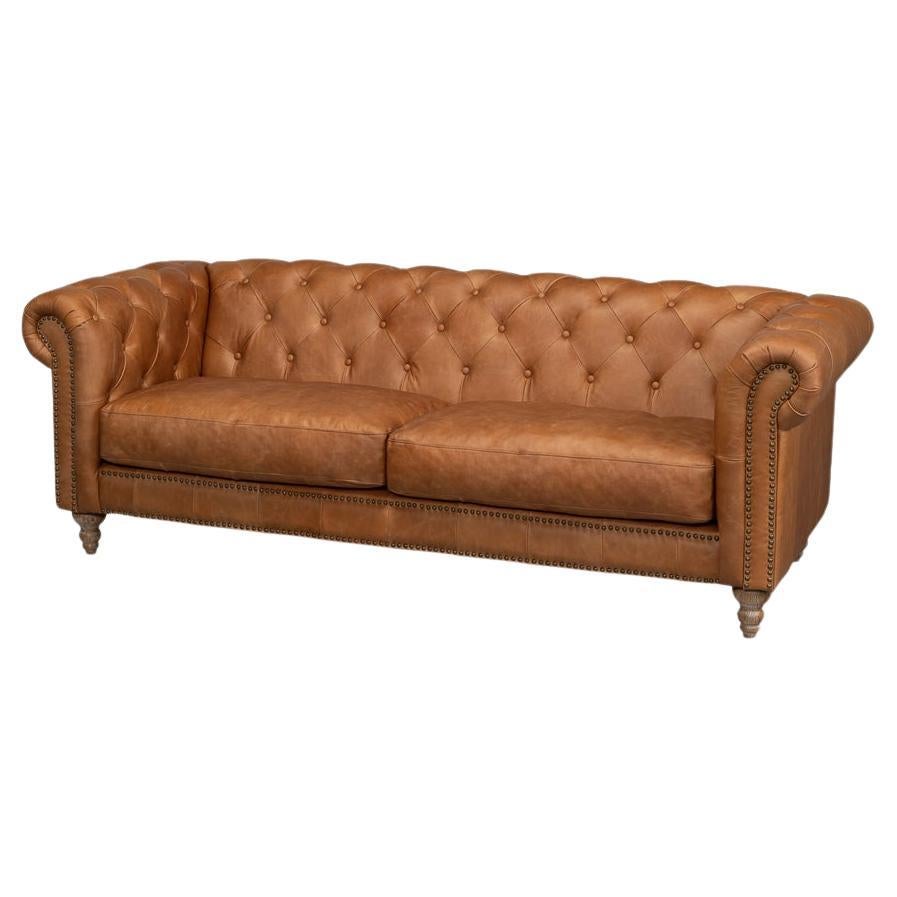 https://a.1stdibscdn.com/tufted-leather-chesterfield-sofa-for-sale/f_8038/f_389212821710904814552/f_38921282_1710904814780_bg_processed.jpg