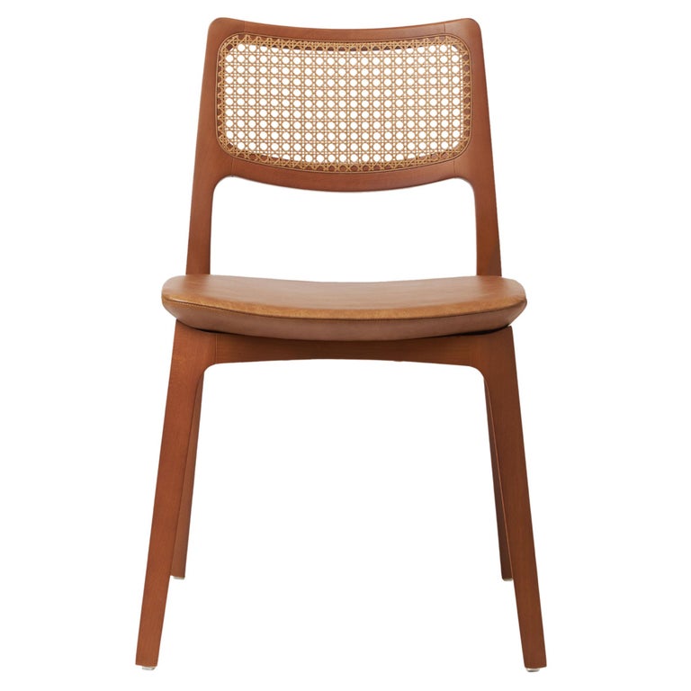 https://a.1stdibscdn.com/modern-style-aurora-chair-sculpted-in-walnut-finish-no-arms-leather-seating-for-sale/f_35593/f_390184821711480662858/f_39018482_1711480663721_bg_processed.jpg?width=768