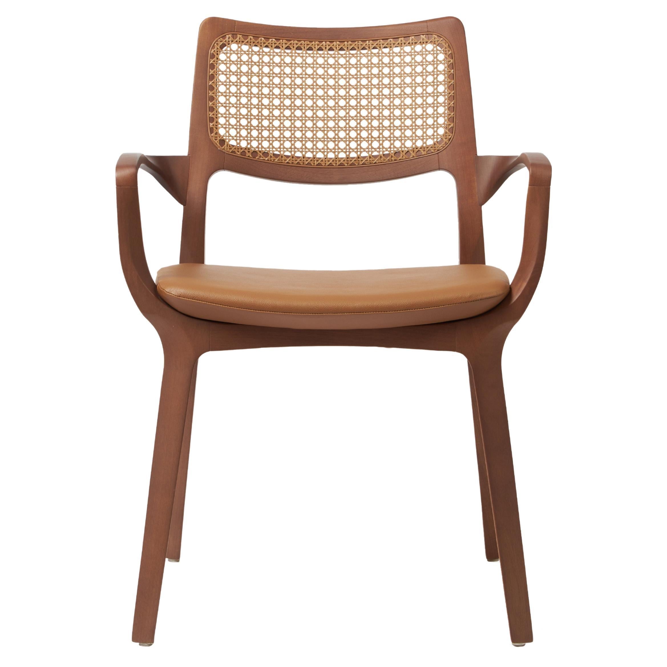 https://a.1stdibscdn.com/modern-style-aurora-chair-sculpted-in-walnut-finish-arms-leather-seating-cane-for-sale/f_35593/f_390196921711485459000/f_39019692_1711485459799_bg_processed.jpg