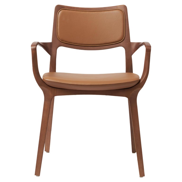 https://a.1stdibscdn.com/modern-style-aurora-chair-sculpted-in-walnut-finish-arms-leather-back-seating-for-sale/f_35593/f_390205821711487250440/f_39020582_1711487251154_bg_processed.jpg?width=768
