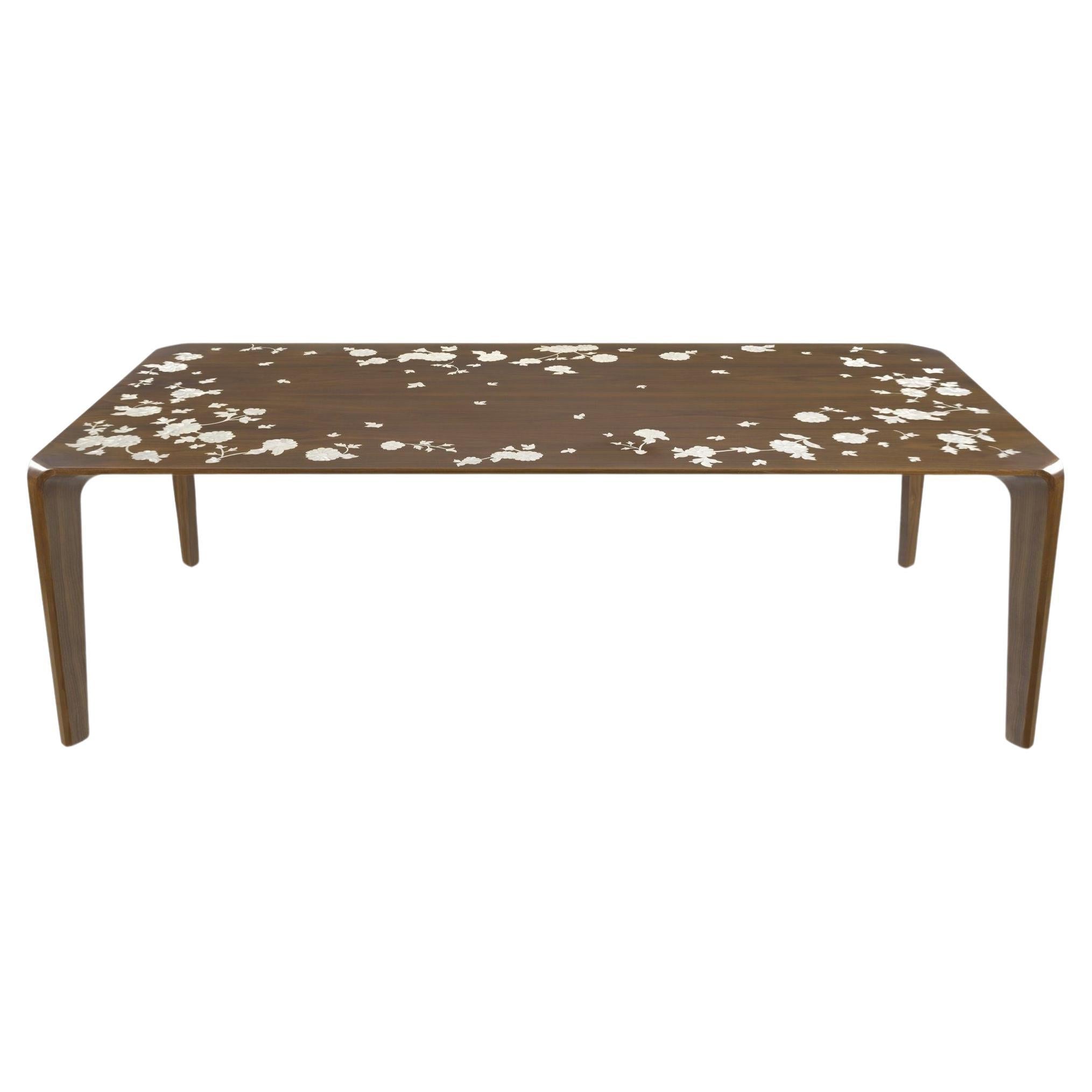 https://a.1stdibscdn.com/dining-table-with-hand-laid-floral-mother-of-pearl-massive-curved-walnut-legs-for-sale/f_58022/f_390839321755772577885/f_39083932_1755772578390_bg_processed.jpg