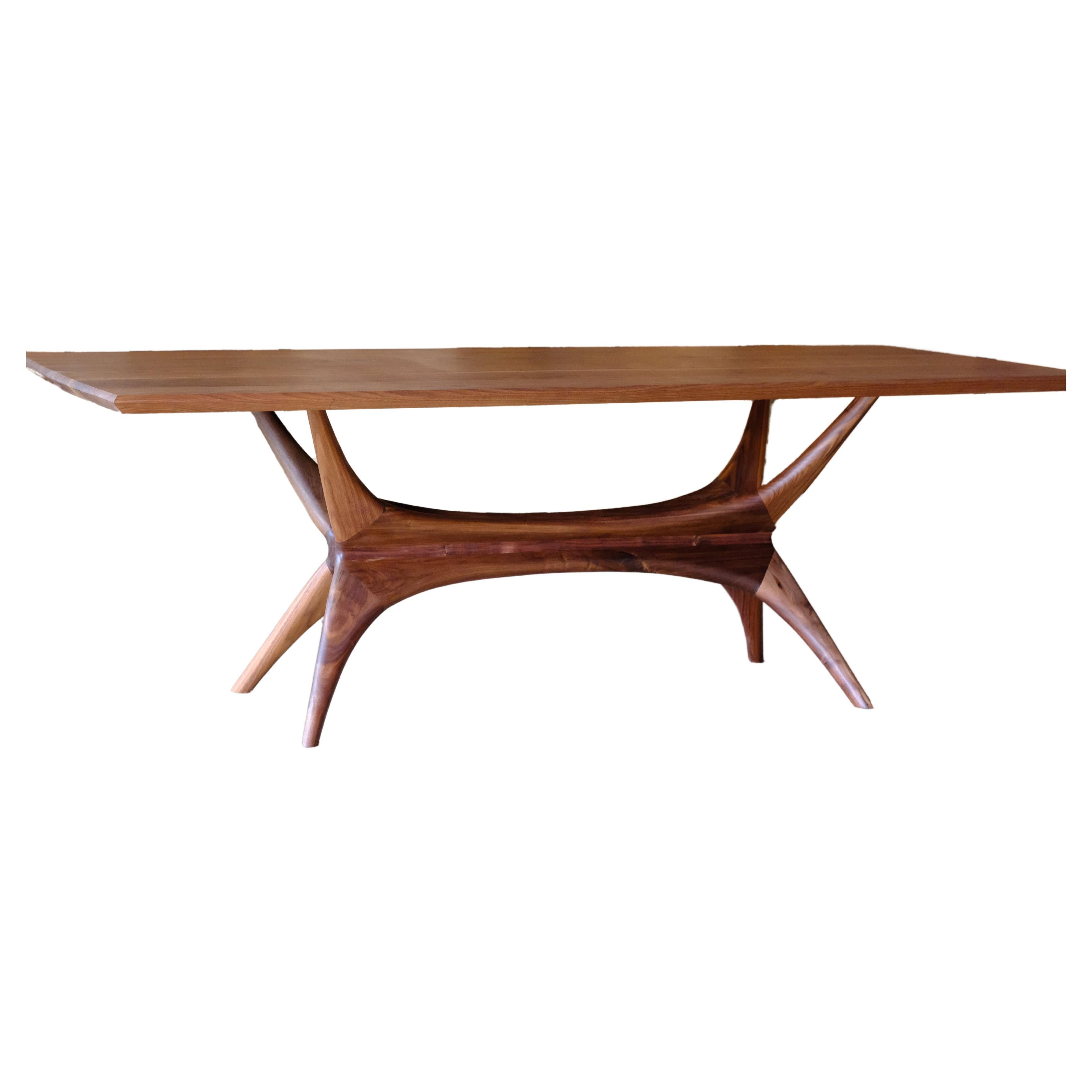 https://a.1stdibscdn.com/mid-century-modern-walnut-dining-table-for-sale/f_86092/f_391216021712169425458/f_39121602_1712169426947_bg_processed.jpg