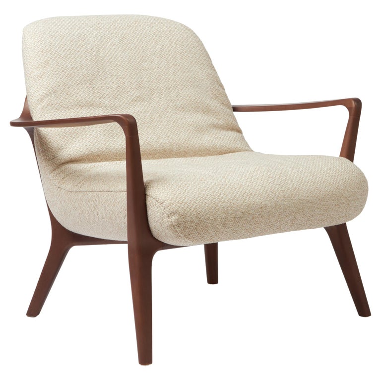 https://a.1stdibscdn.com/minimal-style-insigne-armchair-sculpted-in-walnut-wood-finish-textiles-seating-for-sale/f_35593/f_391247321712182153477/f_39124732_1712182154502_bg_processed.jpg?width=768