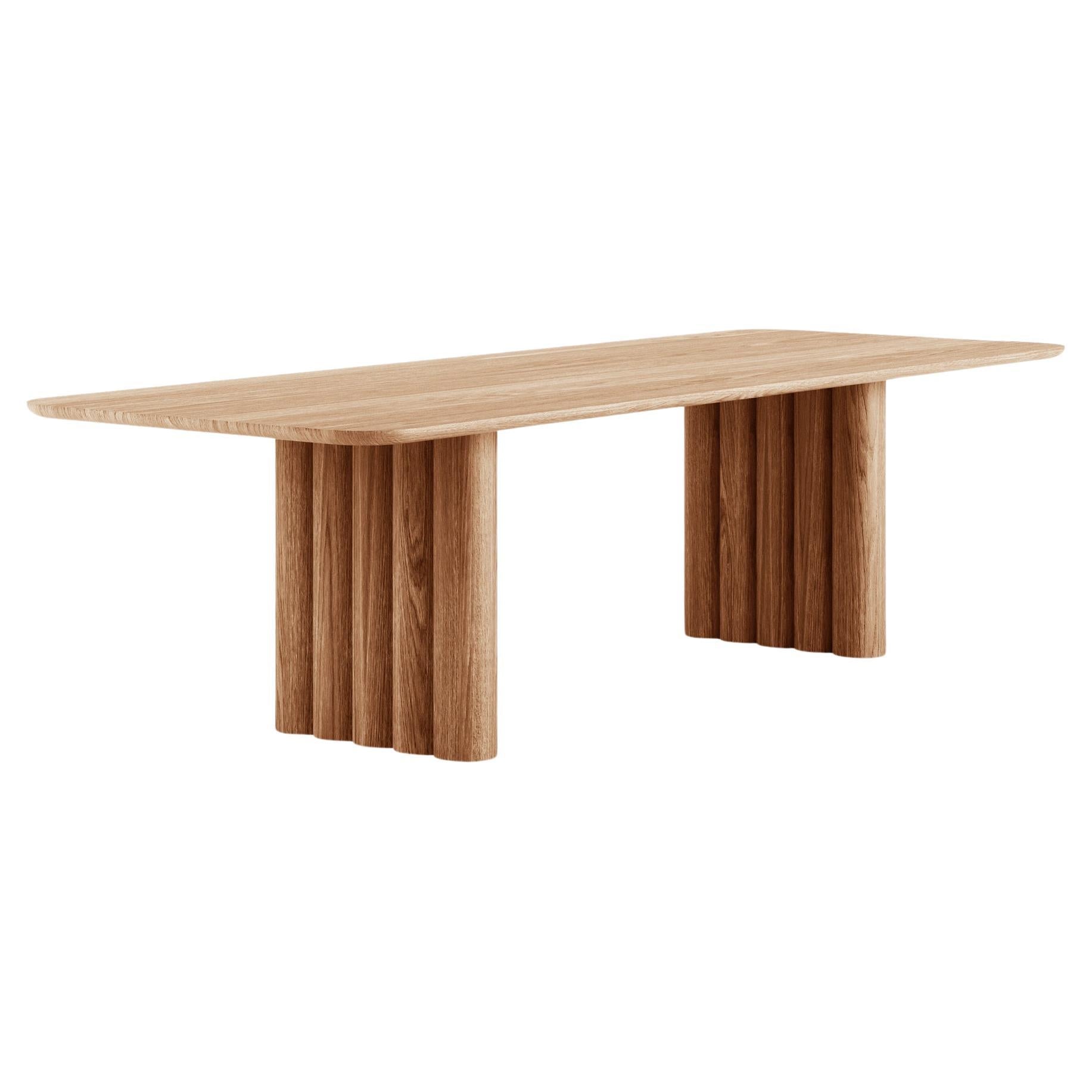 https://a.1stdibscdn.com/contemporary-dining-table-plush-by-dk3-light-oak-370-rectangular-for-sale/f_31233/f_391843621712584425950/f_39184362_1712584426370_bg_processed.jpg