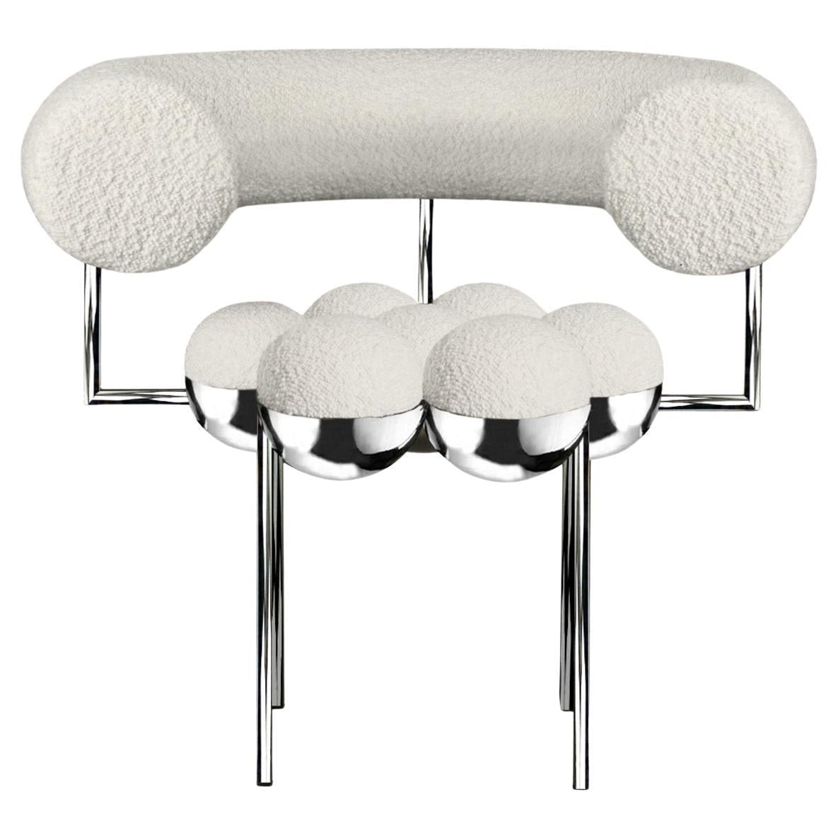 https://a.1stdibscdn.com/saturn-chair-chrome-finish-steel-frame-and-cream-boucle-wool-by-lara-bohinc-for-sale/f_19173/f_392752921713172112483/f_39275292_1713172112790_bg_processed.jpg