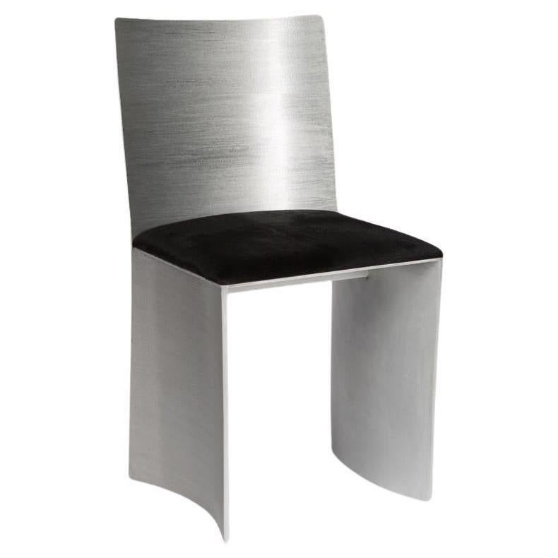 https://a.1stdibscdn.com/isu-lowback-textured-satin-metal-chair-by-soraya-osorio-for-sale/f_31433/f_39298952/f_39298952_1713295315332_1713295370729_master.jpg