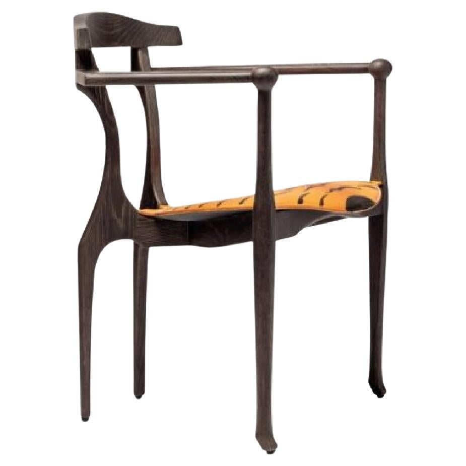 https://a.1stdibscdn.com/tiger-art-gaulino-limited-edition-chair-by-oscar-tusquets-for-bd-barcelona-for-sale/f_16392/f_393988121713888149927/f_39398812_1713888150187_bg_processed.jpg
