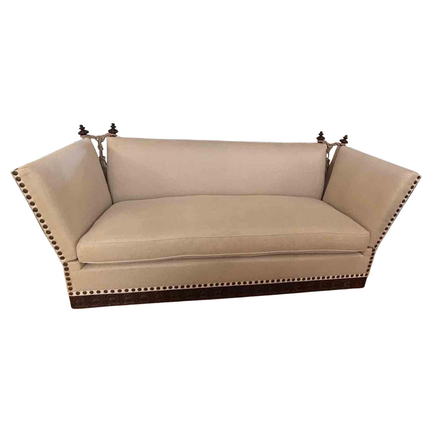 https://a.1stdibscdn.com/made-to-order-classic-drop-arm-knole-sofa-with-carved-solid-walnut-base-for-sale/f_8812/f_394028721737662712638/f_39402872_1737662713061_bg_processed.jpg