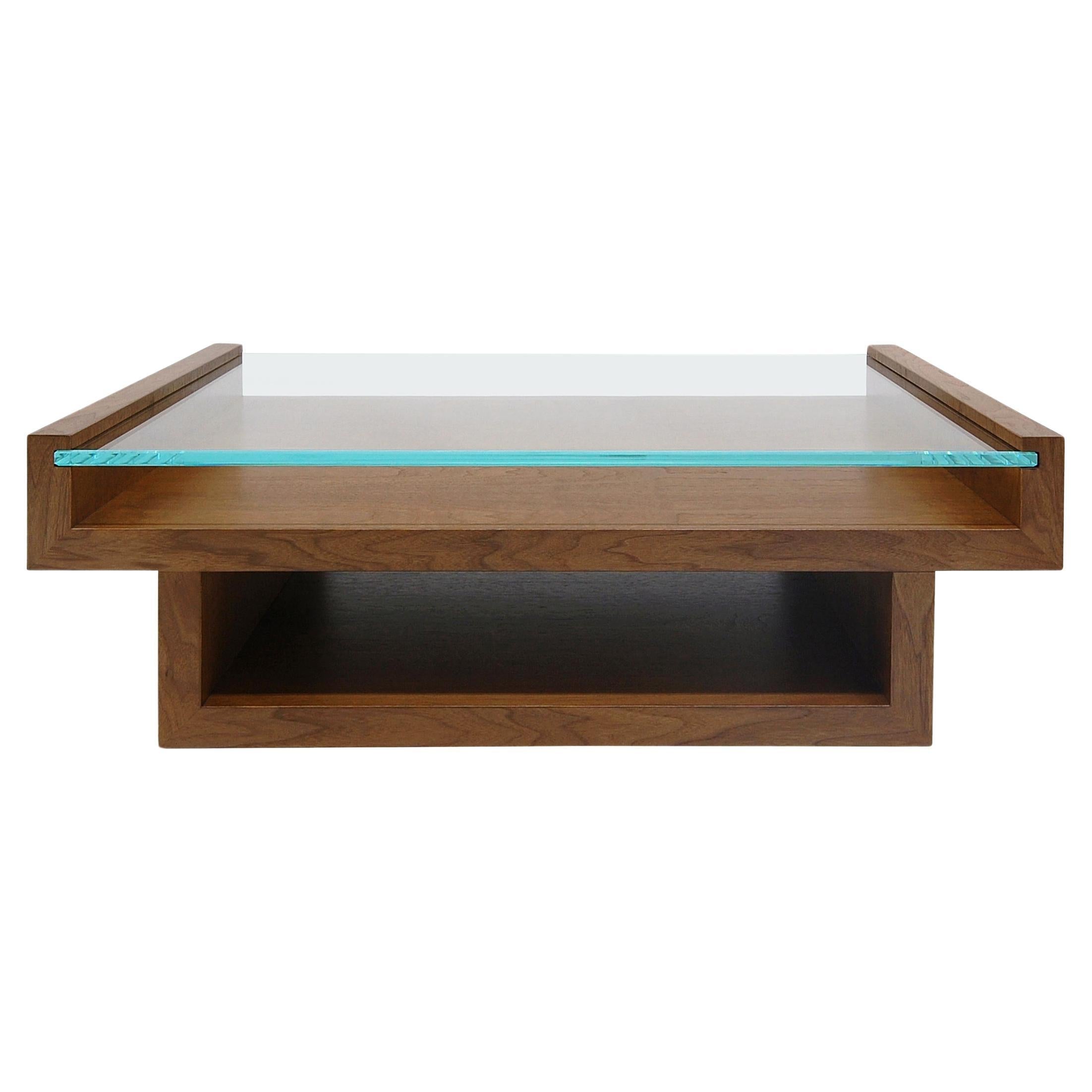 https://a.1stdibscdn.com/hinge-coffee-table-walnut-with-glass-top-custom-for-sale/f_31463/f_395033821714488982943/f_39503382_1714488983589_bg_processed.jpg