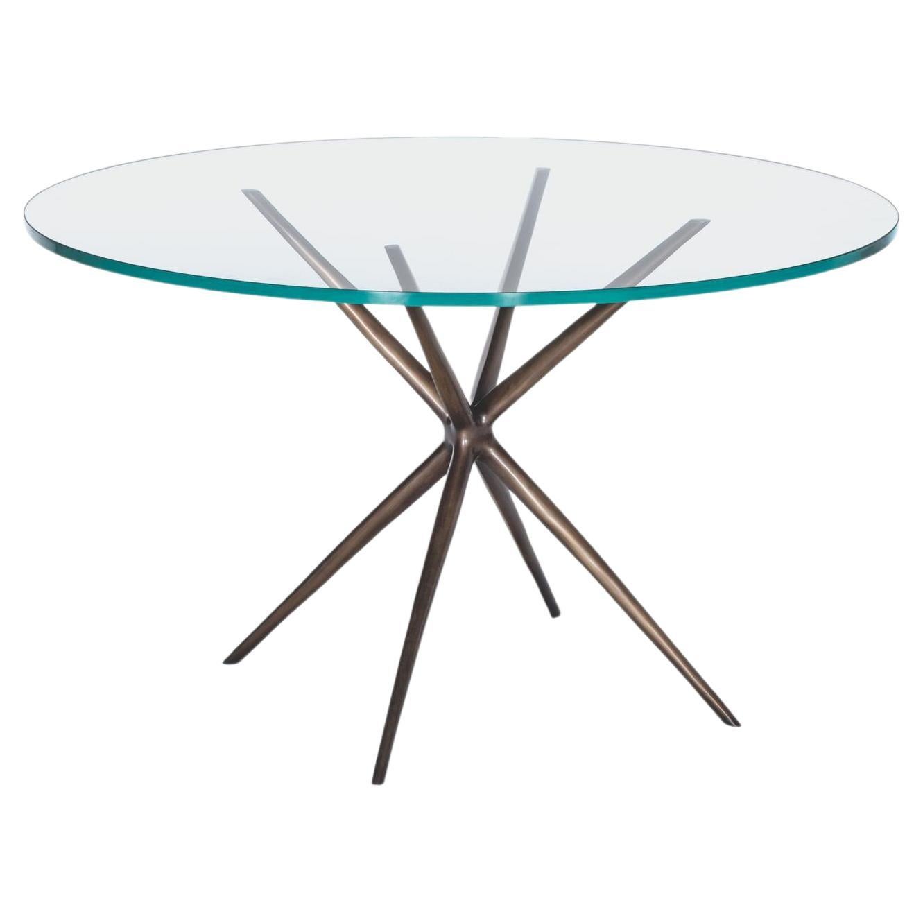 https://a.1stdibscdn.com/etoile-dining-table-monumnet-light-bronze-3-4-starfire-glass-for-sale/f_34931/f_395053121714495170923/f_39505312_1714495171270_bg_processed.jpg