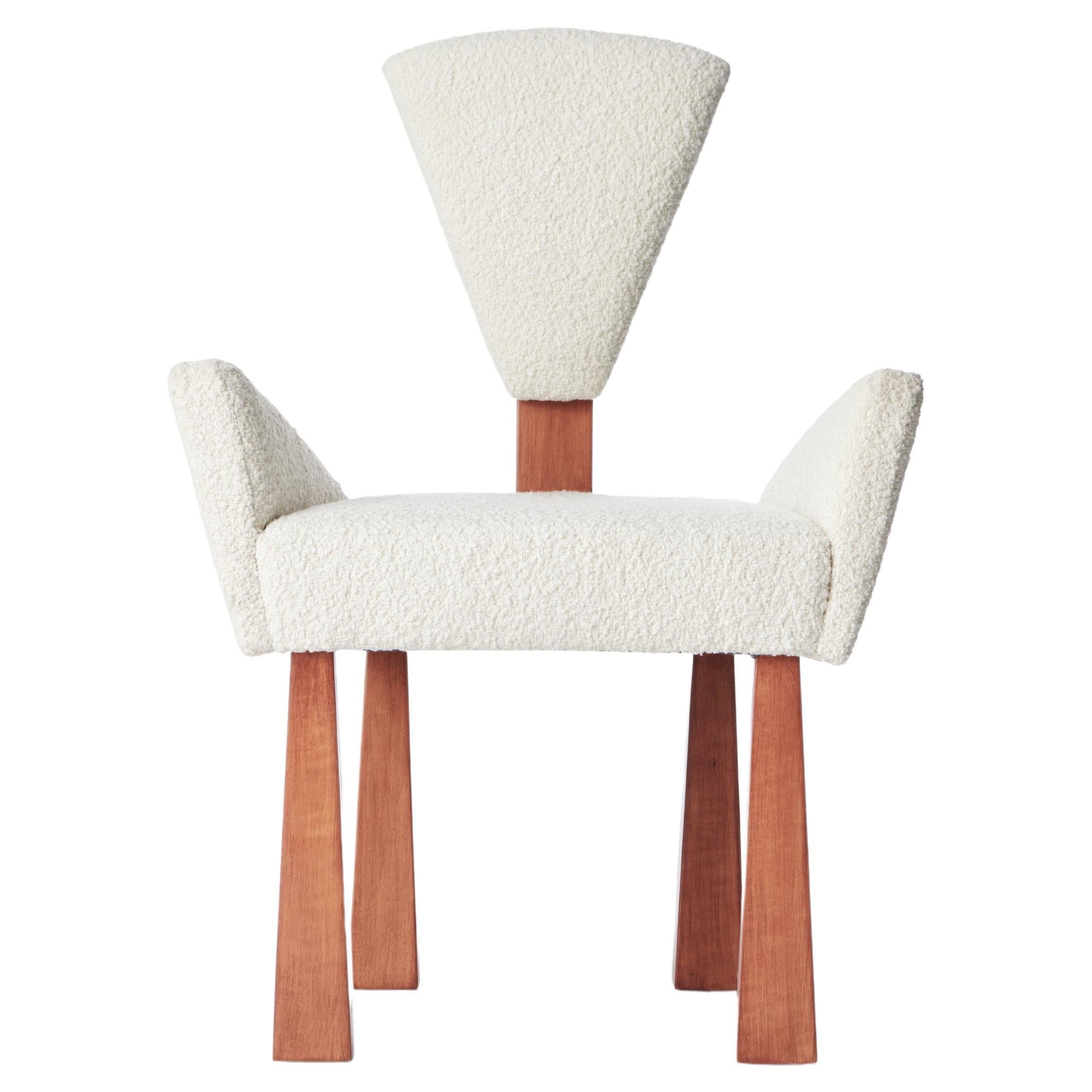 https://a.1stdibscdn.com/lucien-dining-chair-ivory-boucle-wood-by-christian-siriano-for-sale/f_56972/f_397307621715792198079/f_39730762_1715792198785_bg_processed.jpg