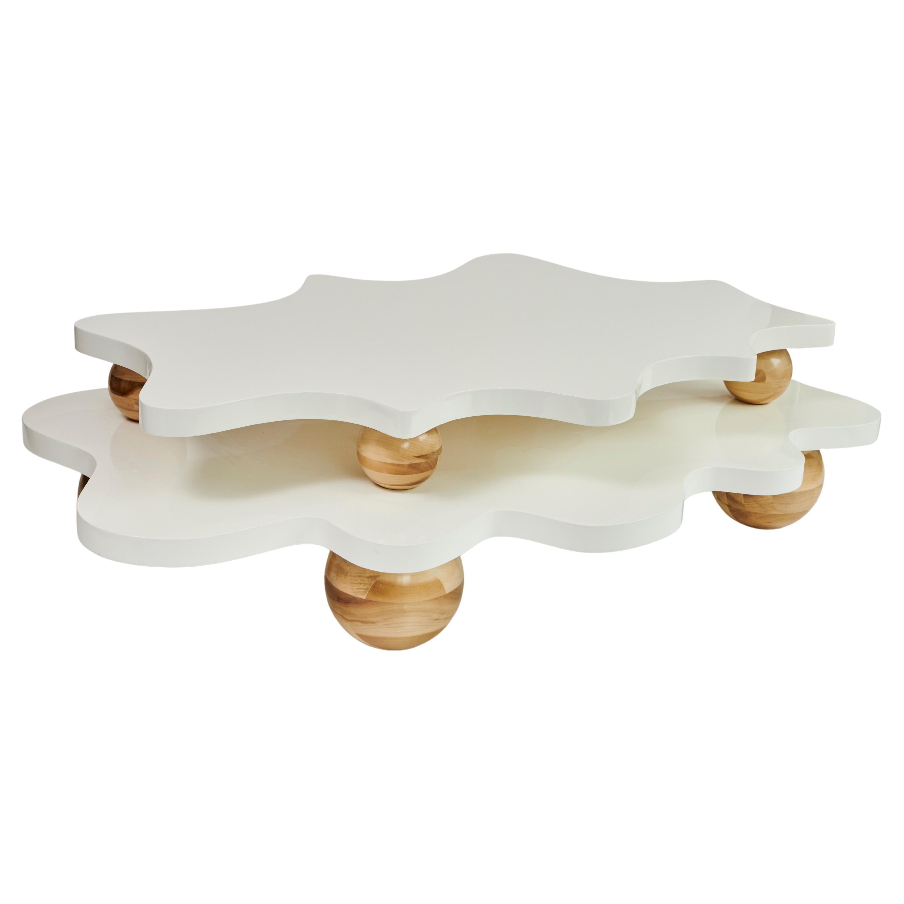 https://a.1stdibscdn.com/double-wave-coffee-table-white-lacquer-table-by-christian-siriano-for-sale/f_56972/f_397332221715799580853/f_39733222_1715799581810_bg_processed.jpg