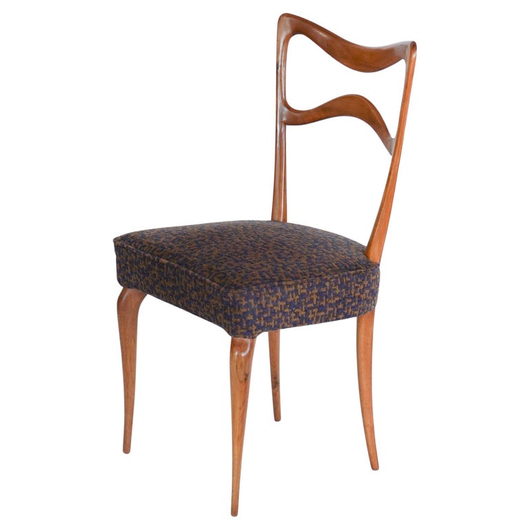 https://a.1stdibscdn.com/armonia-walnut-dining-chair-silvio-piattelli-design-made-in-italy-for-sale/f_25683/f_398210221716321574240/f_39821022_1716321574740_bg_processed.jpg?width=768