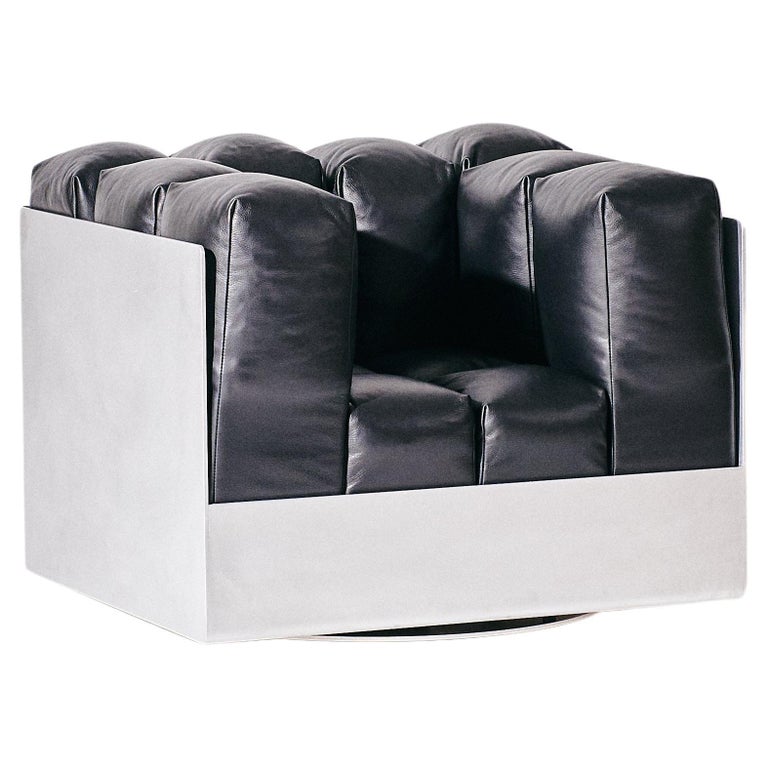 https://a.1stdibscdn.com/the-marshmallow-lounge-swivel-lounge-chair-in-black-leather-with-aluminum-frame-for-sale/f_28533/f_398241621716337149530/f_39824162_1716337150083_bg_processed.jpg?width=768