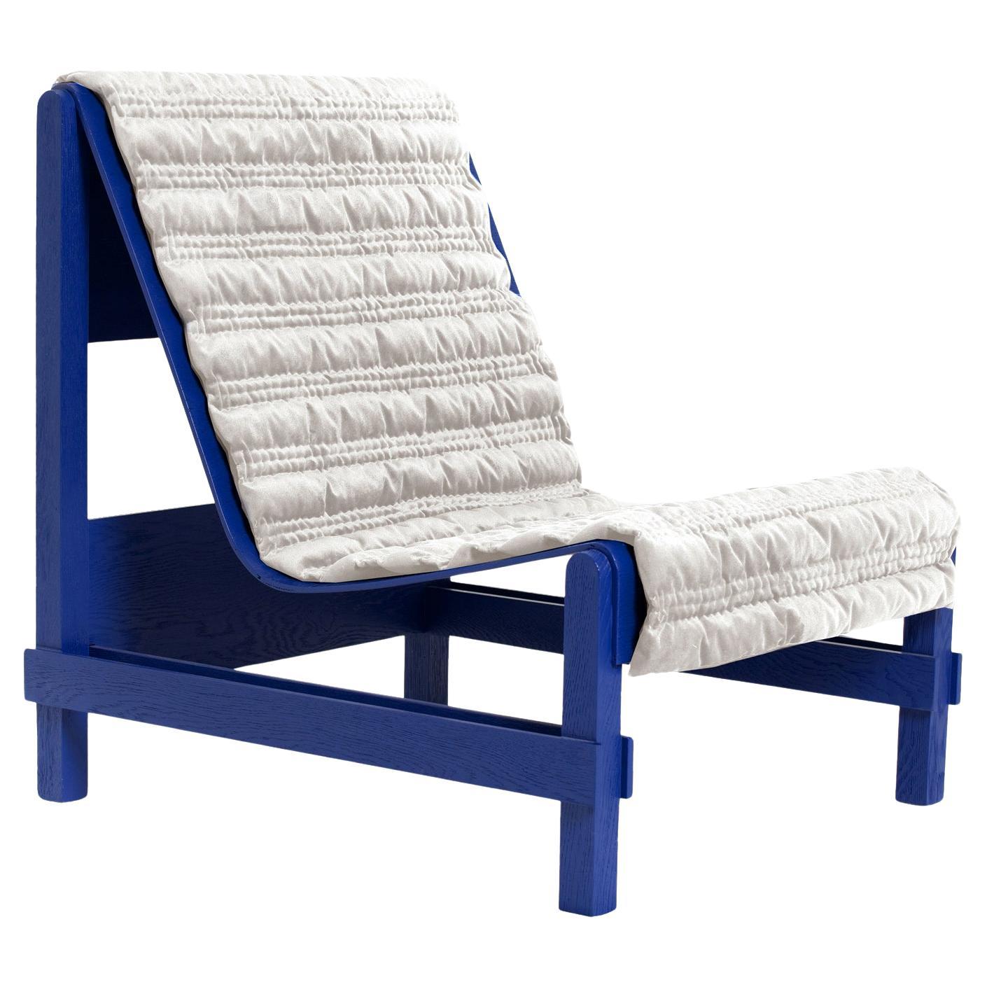 https://a.1stdibscdn.com/ripple-armchair-reflecting-contemporary-and-modern-with-turkish-quilting-in-blue-for-sale/f_68572/f_398312321744810063324/f_39831232_1744810063780_bg_processed.jpg