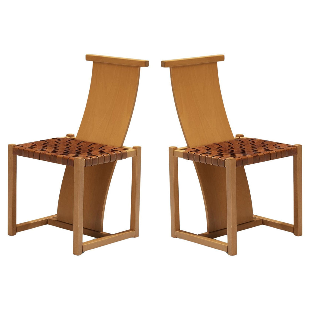 https://a.1stdibscdn.com/italian-pair-of-dining-chairs-with-woven-leather-seats-for-sale/f_9331/f_399064221717165996930/f_39906422_1717165997470_bg_processed.jpg