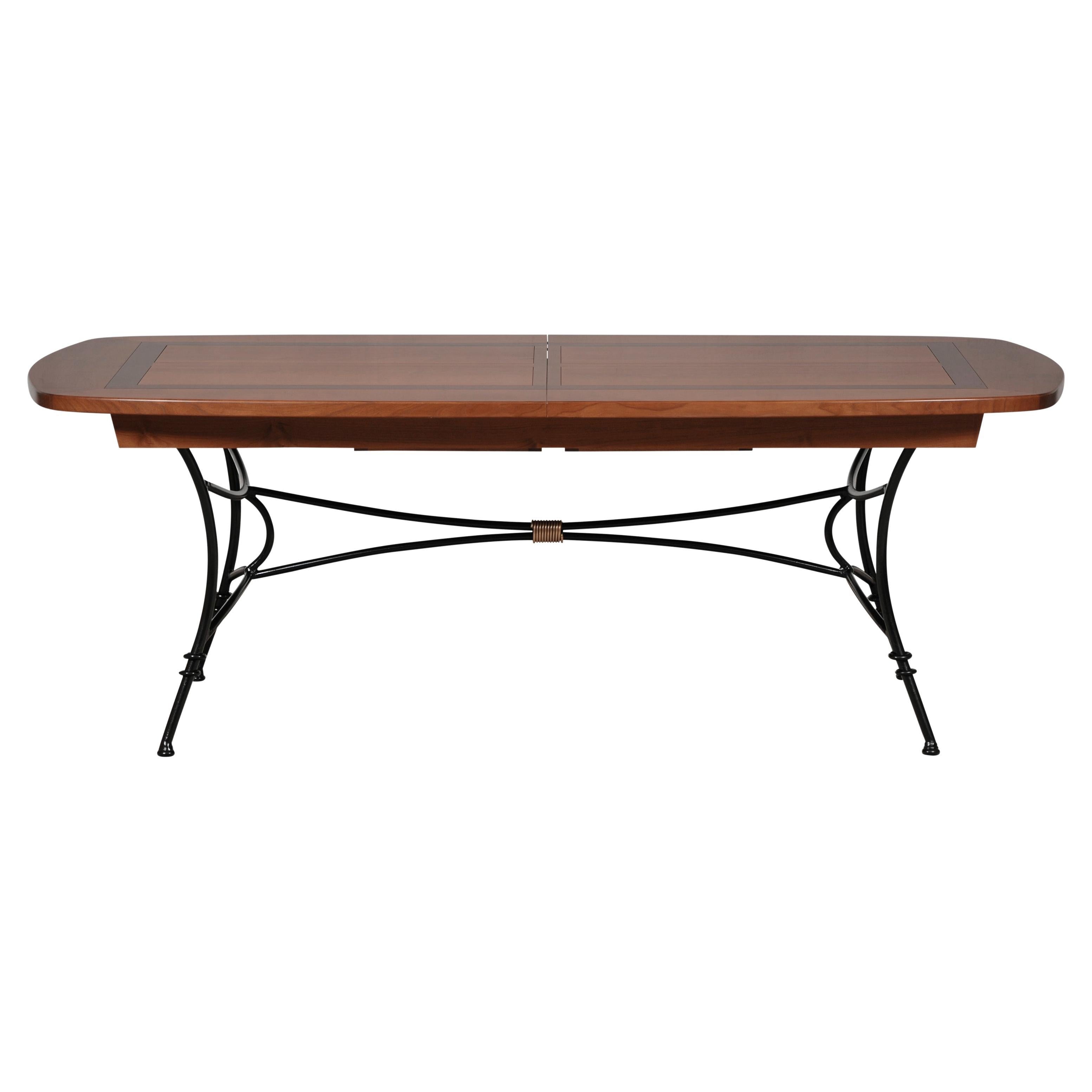 https://a.1stdibscdn.com/wrought-iron-table-with-solid-cherry-top-integrated-extensions-for-sale/f_57342/f_404705721720087821826/f_40470572_1720087822651_bg_processed.jpg