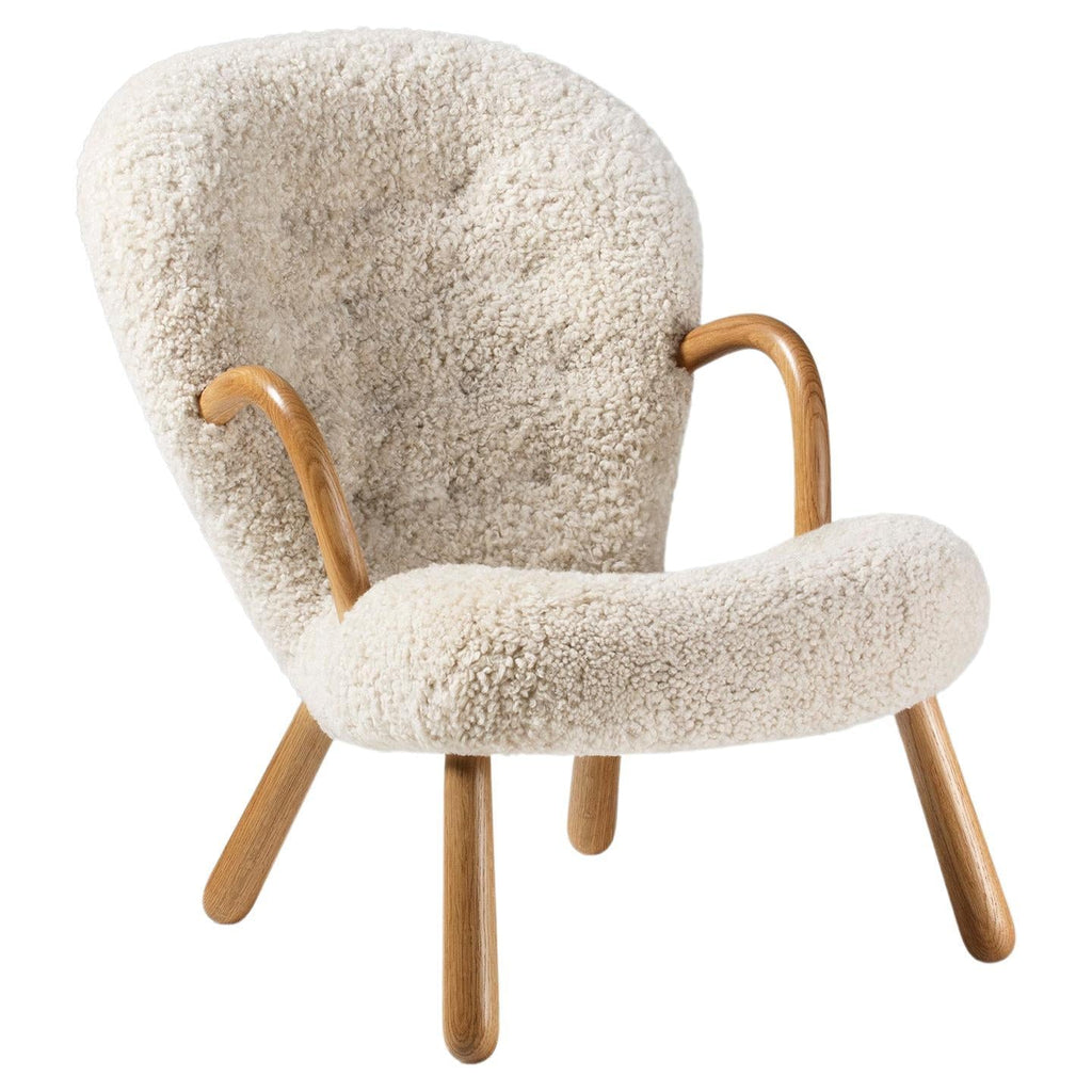 https://a.1stdibscdn.com/arnold-madsen-sheepskin-clam-chair-new-edition-for-sale/f_13332/f_406689721721213725910/f_40668852_1721213561649_bg_processed.jpg