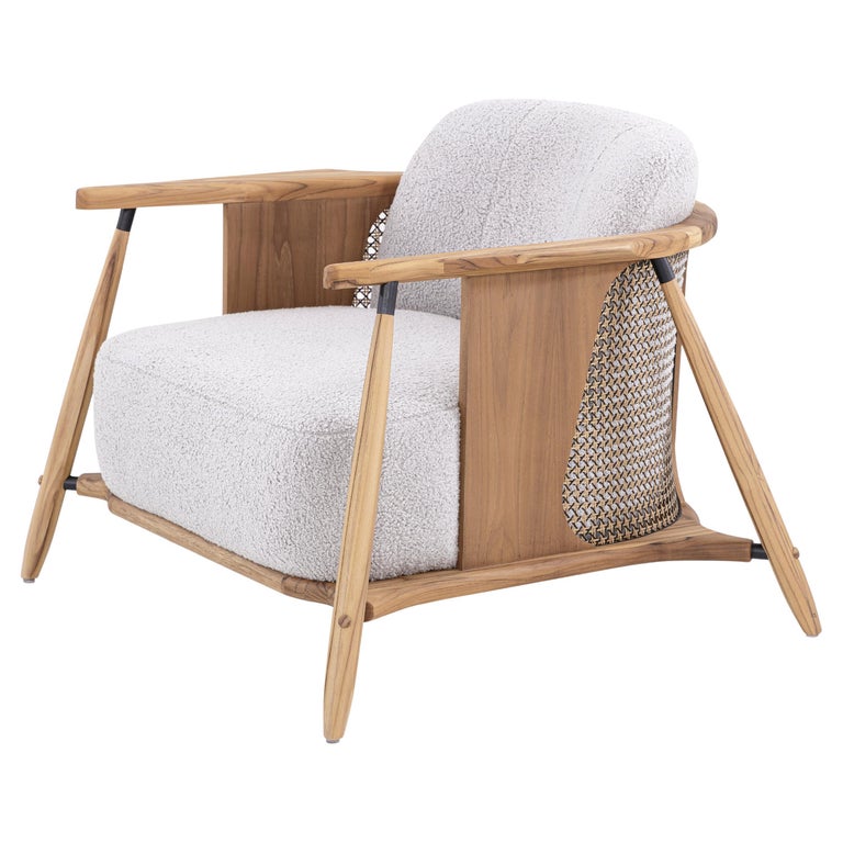 https://a.1stdibscdn.com/customizable-teak-wood-accent-chair-with-cane-back-and-gray-upholstery-laguna-for-sale/f_52822/f_406754721732727084107/f_40675472_1732727085453_bg_processed.jpg?width=768