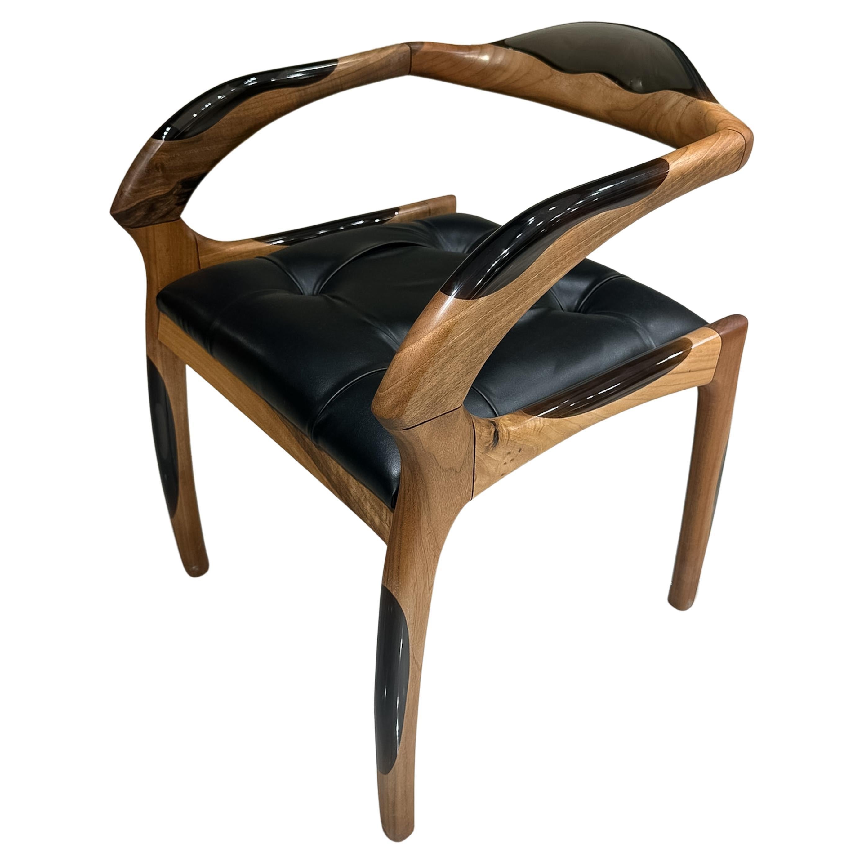https://a.1stdibscdn.com/black-walnut-epoxy-resin-wood-chair-custom-chair-for-sale/f_91932/f_406855721721315576027/f_40685572_1721315577023_bg_processed.jpg