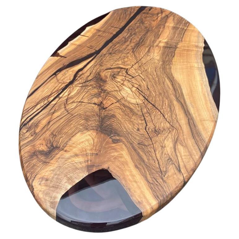 https://a.1stdibscdn.com/oval-dining-table-black-walnut-black-resin-wood-table-for-sale/f_91932/f_407822221721901261517/f_40782222_1721901261854_bg_processed.jpg